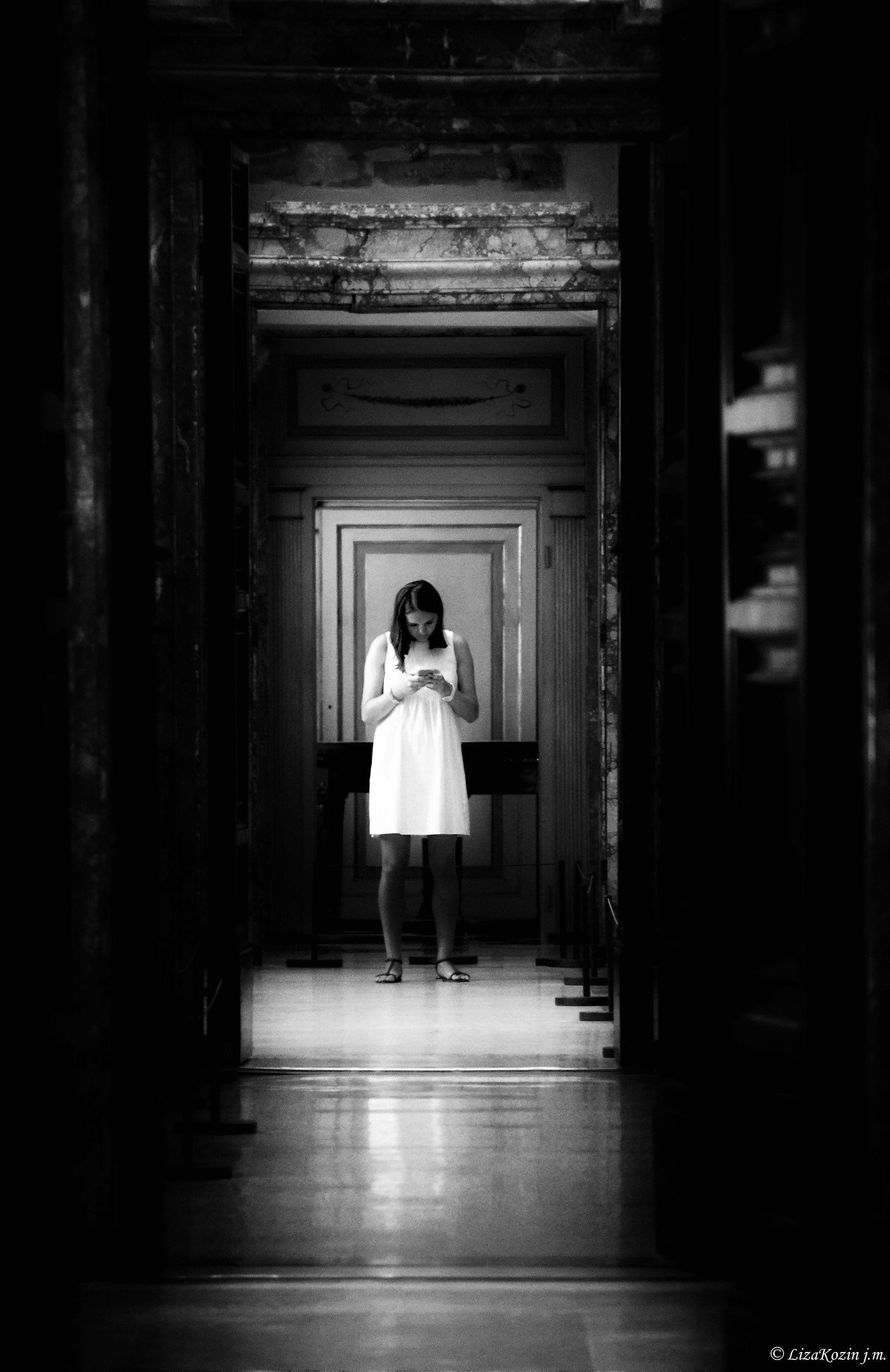 The girl dressed in white