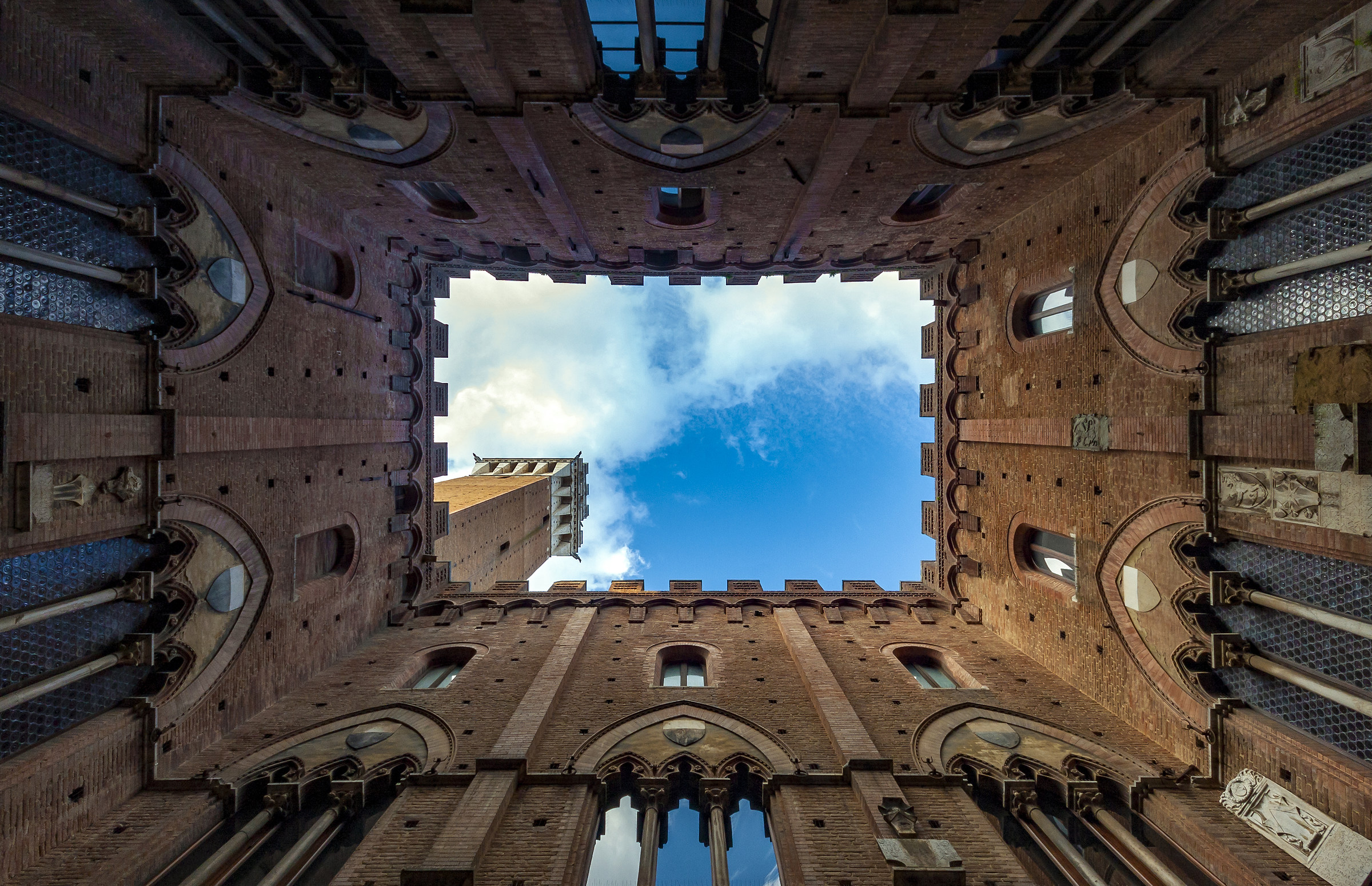 Courtyard of the Podestà and Torre del Mangia in Sien...