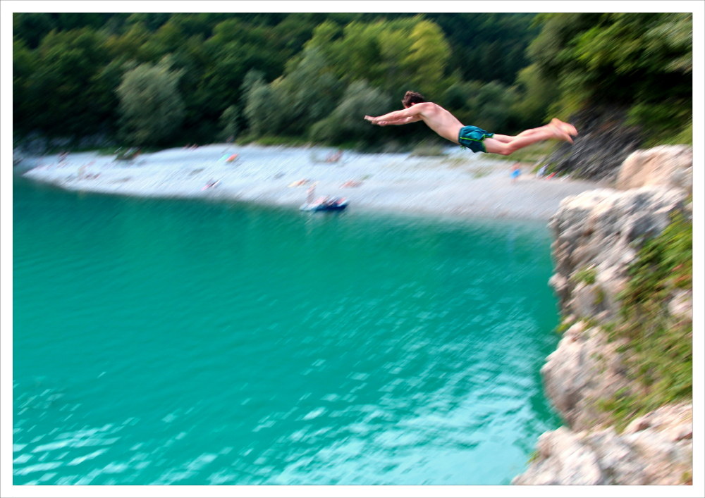 A dip in the limpid waters of Lake Tenno