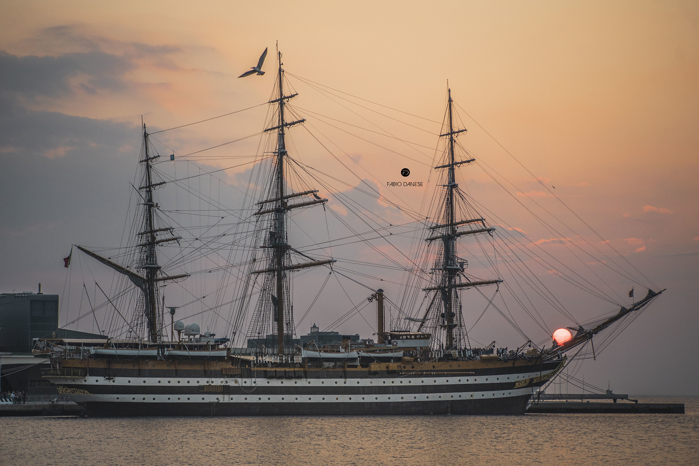 The sun nestled on the Amerigo Vespucci