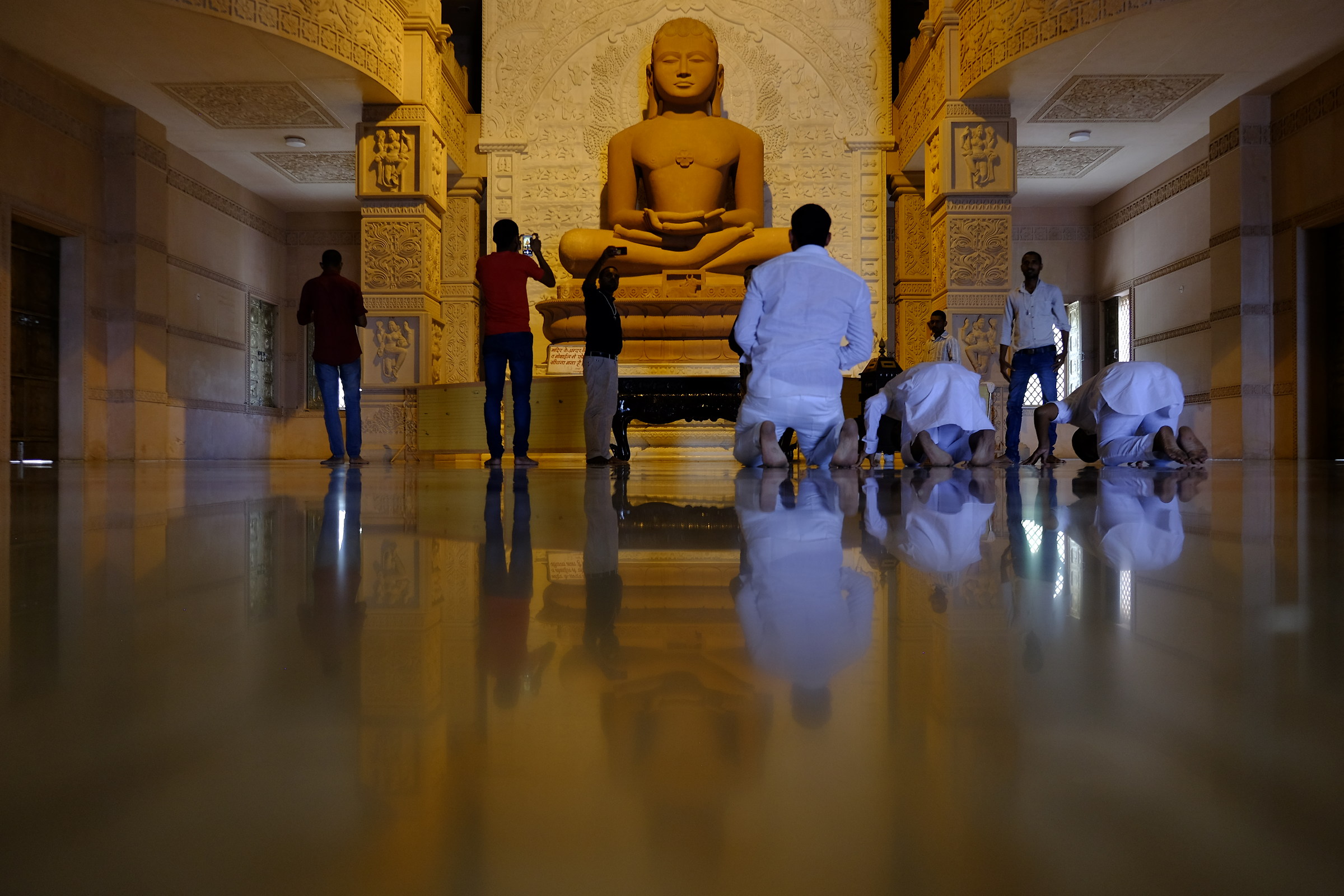 In prayer in the temple dedicated to Buddha