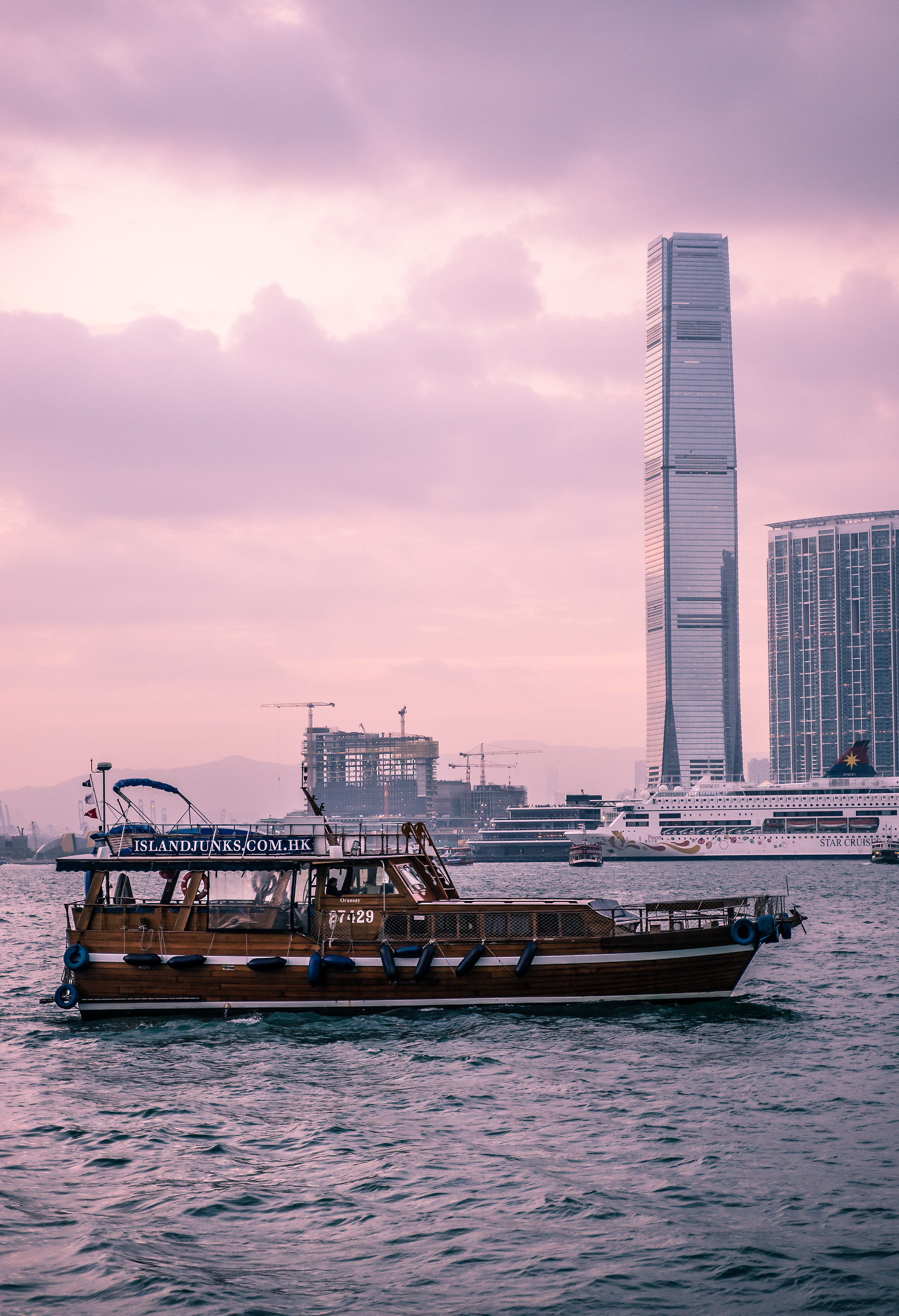 Boat and view of the Ritz Carlton