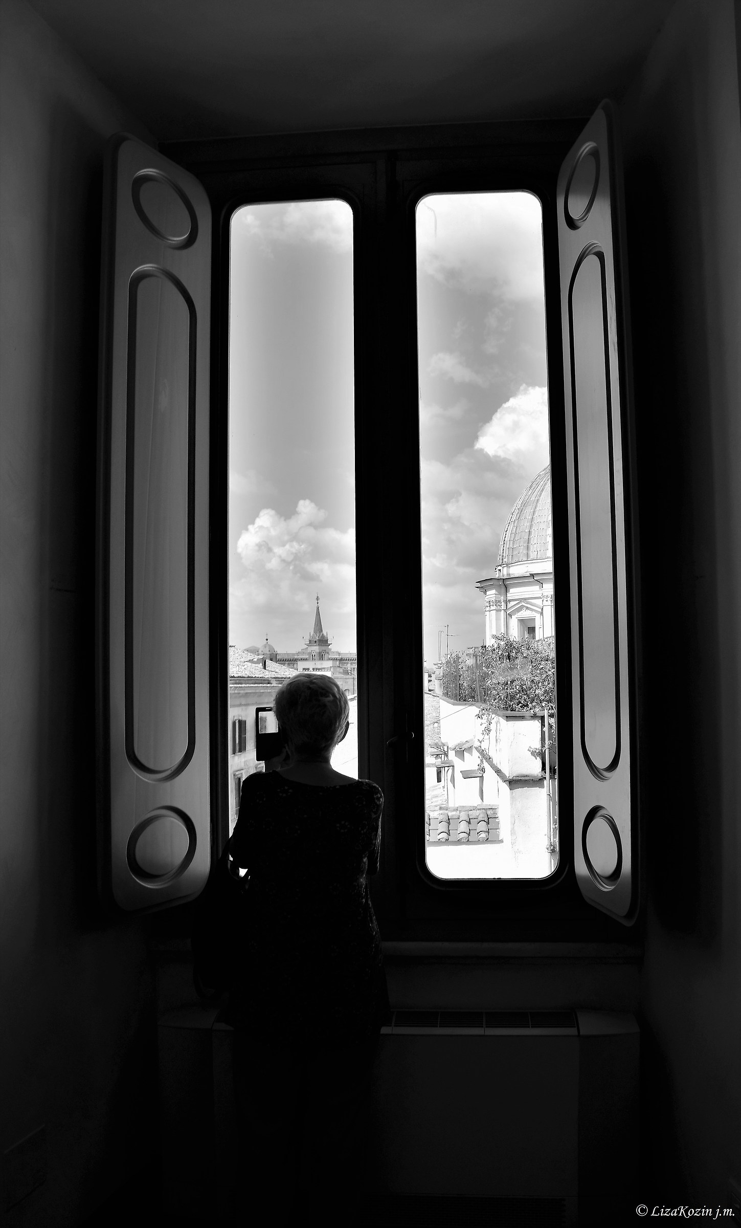 Woman at the window. Palazzo Braschi