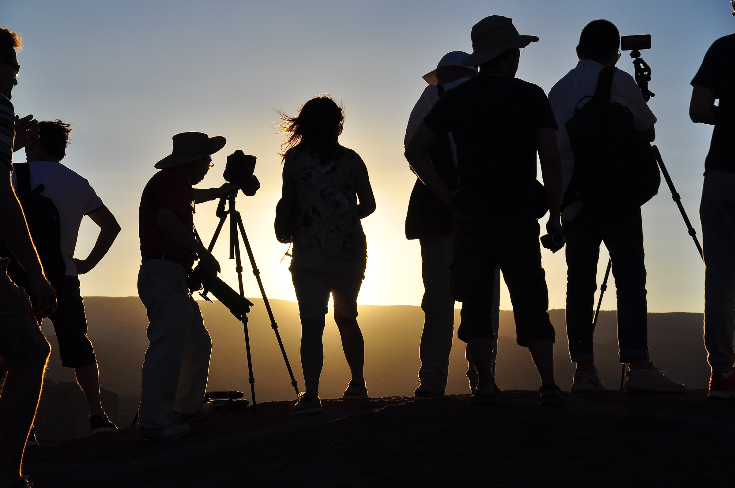 Photographers at sunset