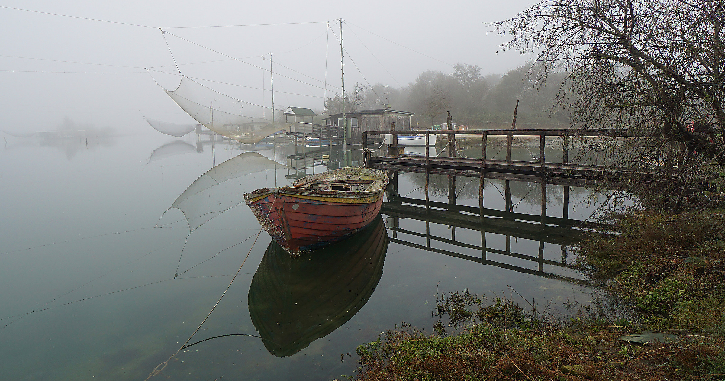Still the mist kissed the valley.