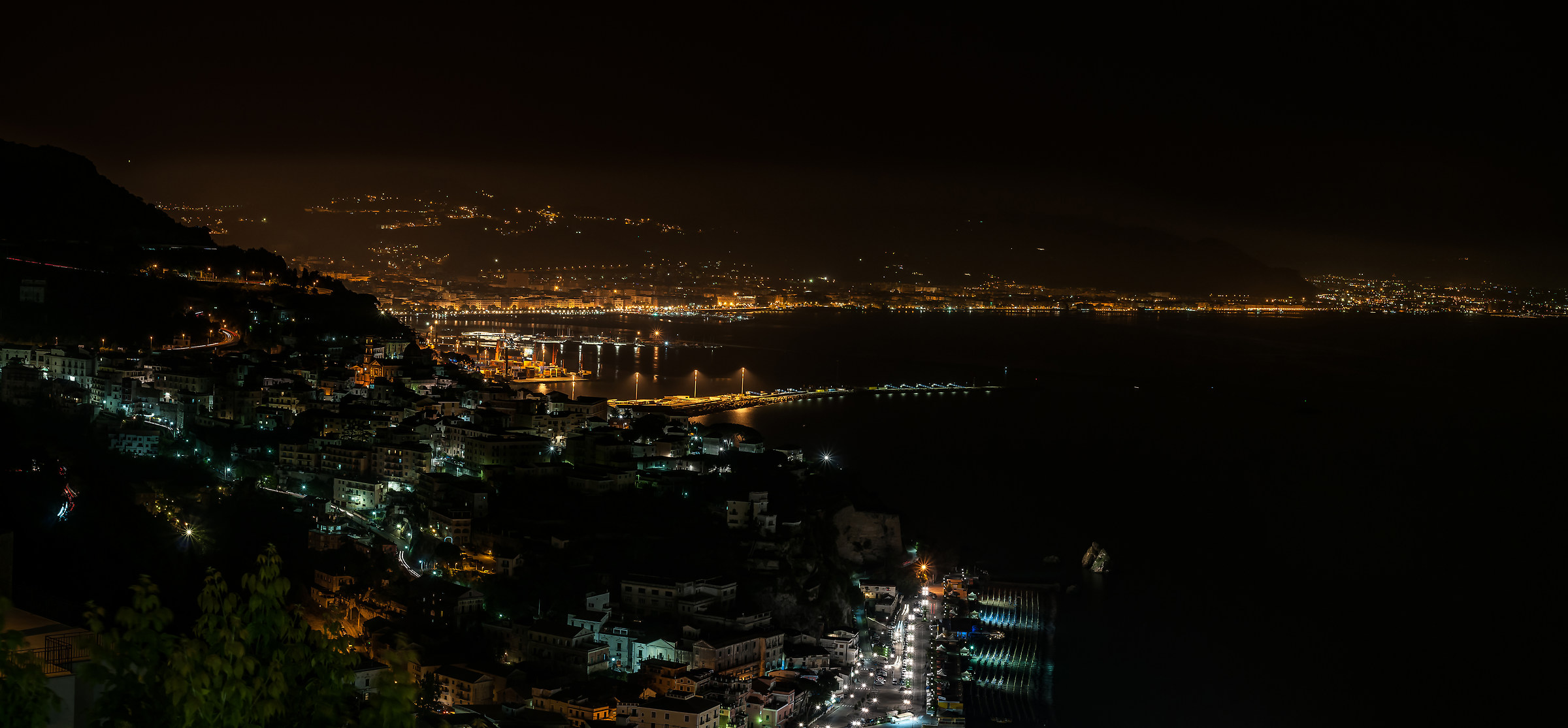 Vietri on the sea at night in the background Salerno