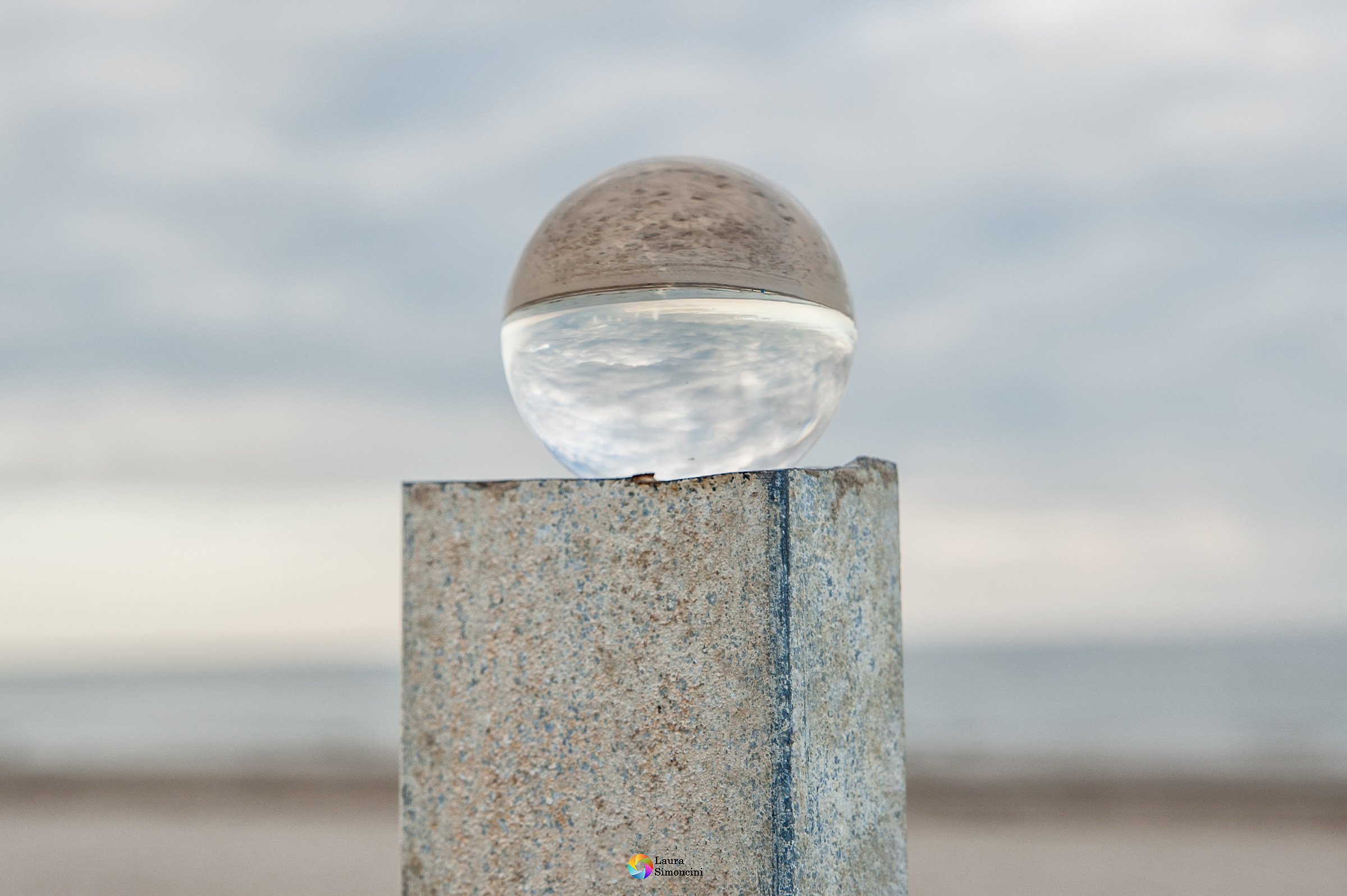 La spiaggia in una sfera