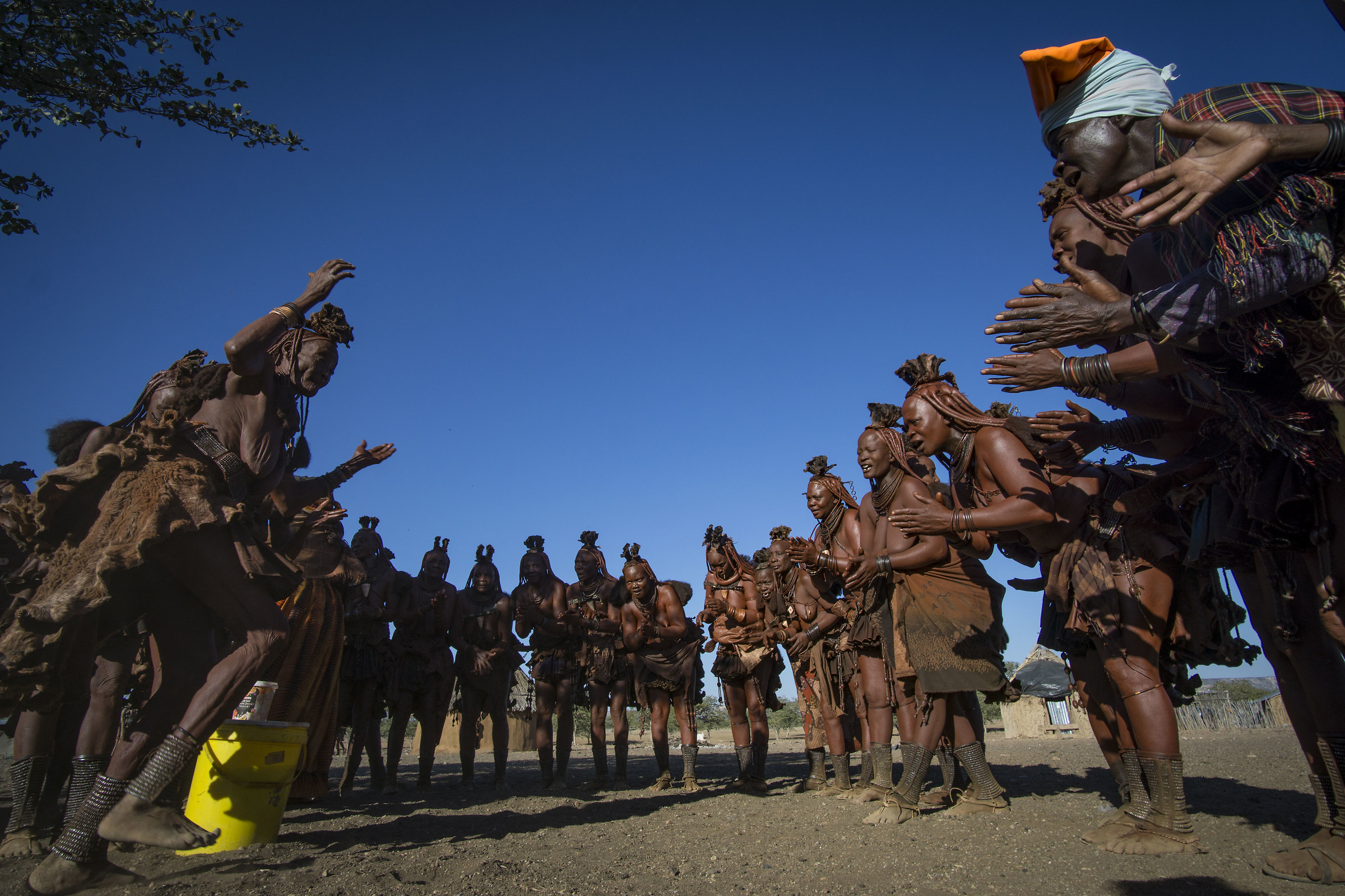 Singing and dancing in a village Himba