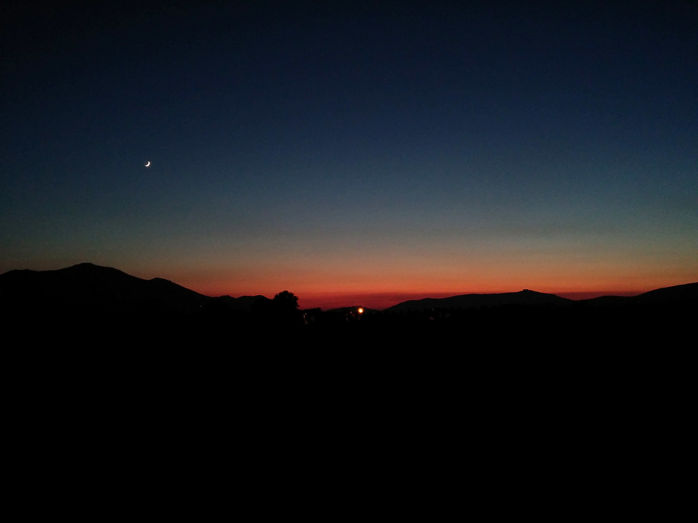 Sunset with Crescent Moon