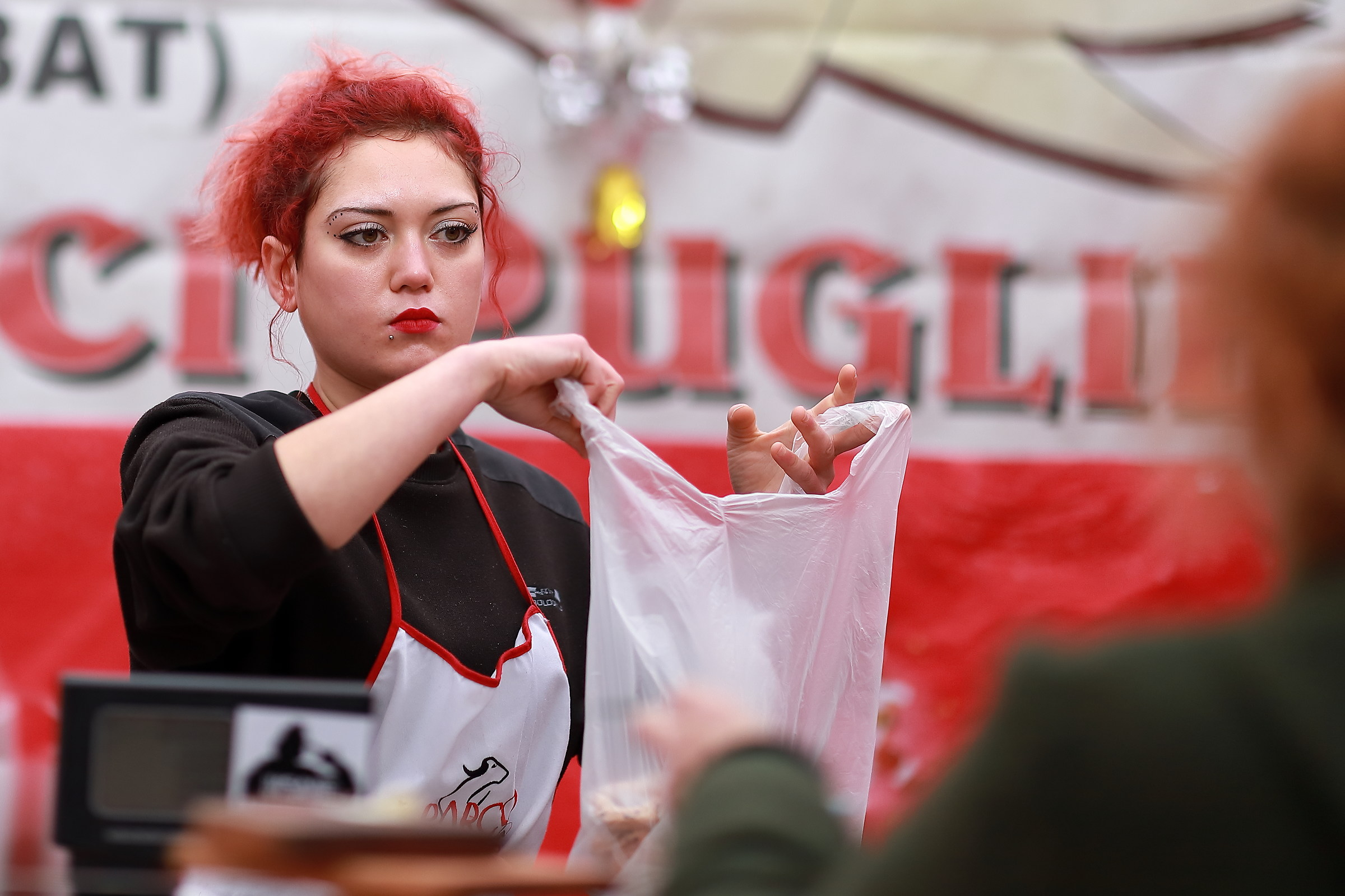 An all red saleswoman