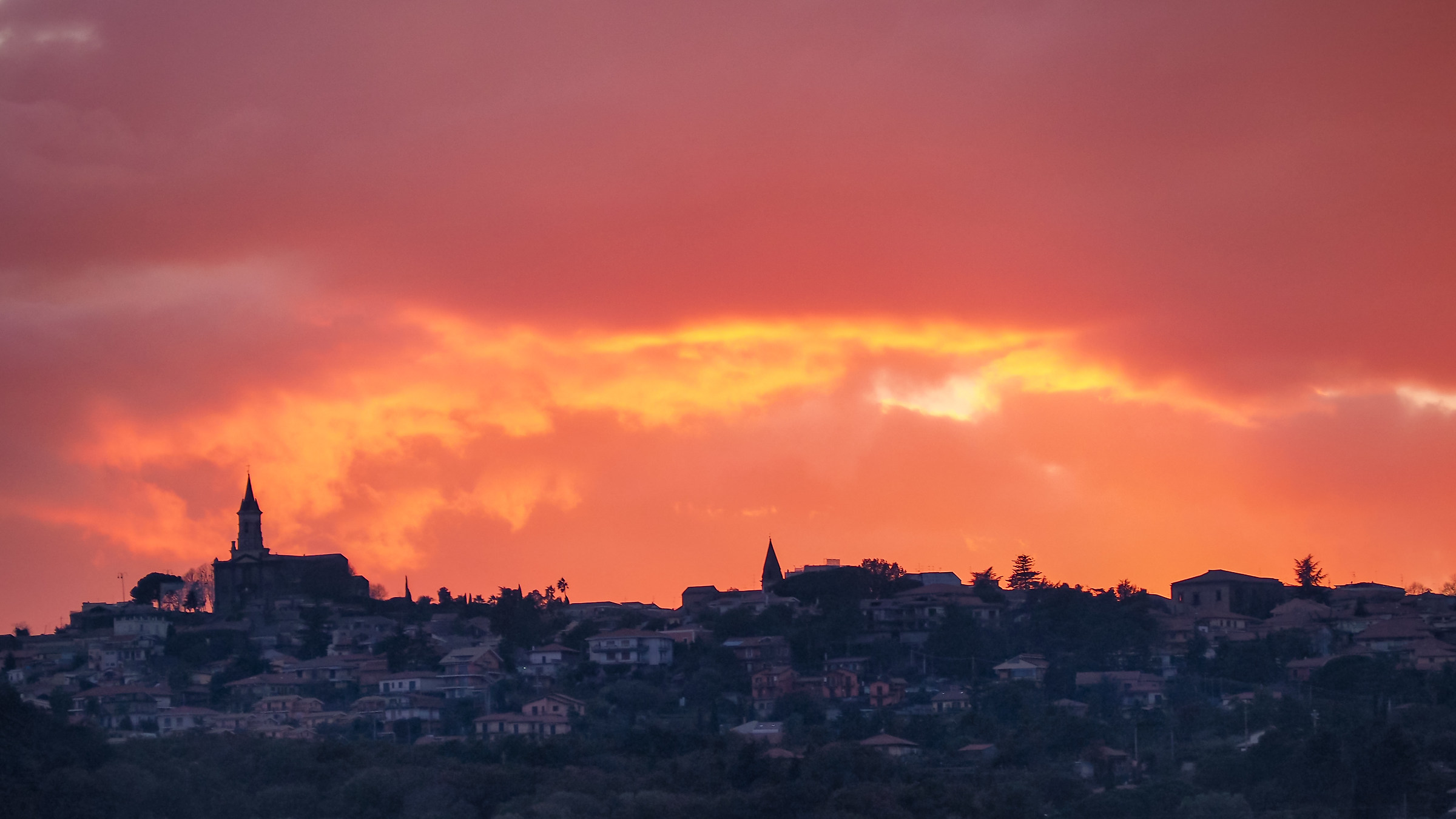 Red sunset on the village of Trecastagni LL