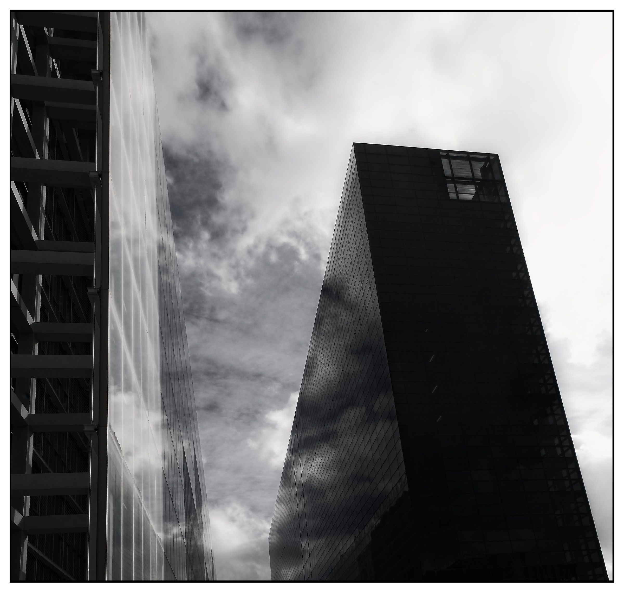 Clouds, Skyscraper and reflections