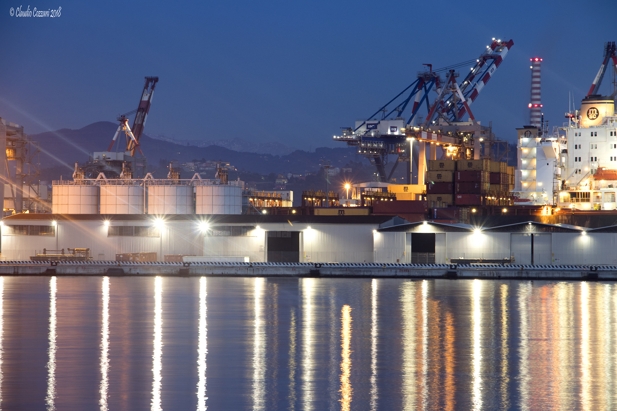 Evening falls to the port