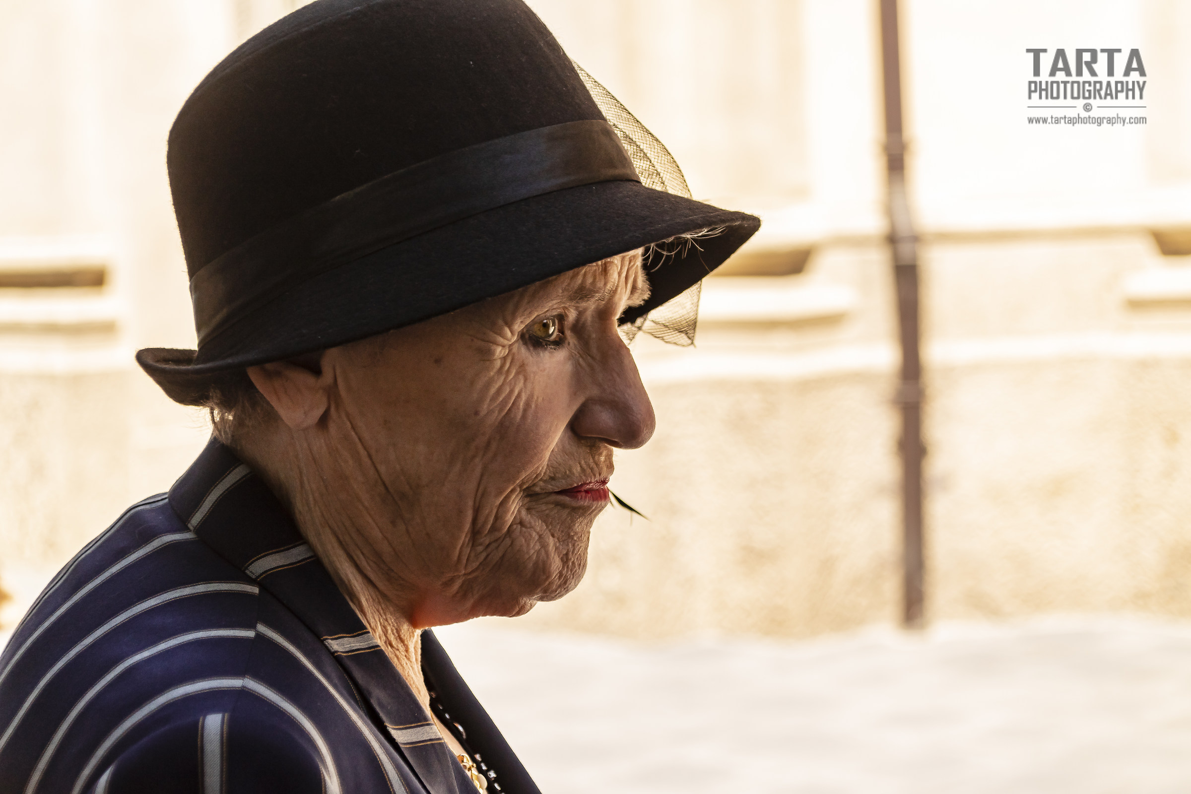 The style of a woman with a hat, the age is zero