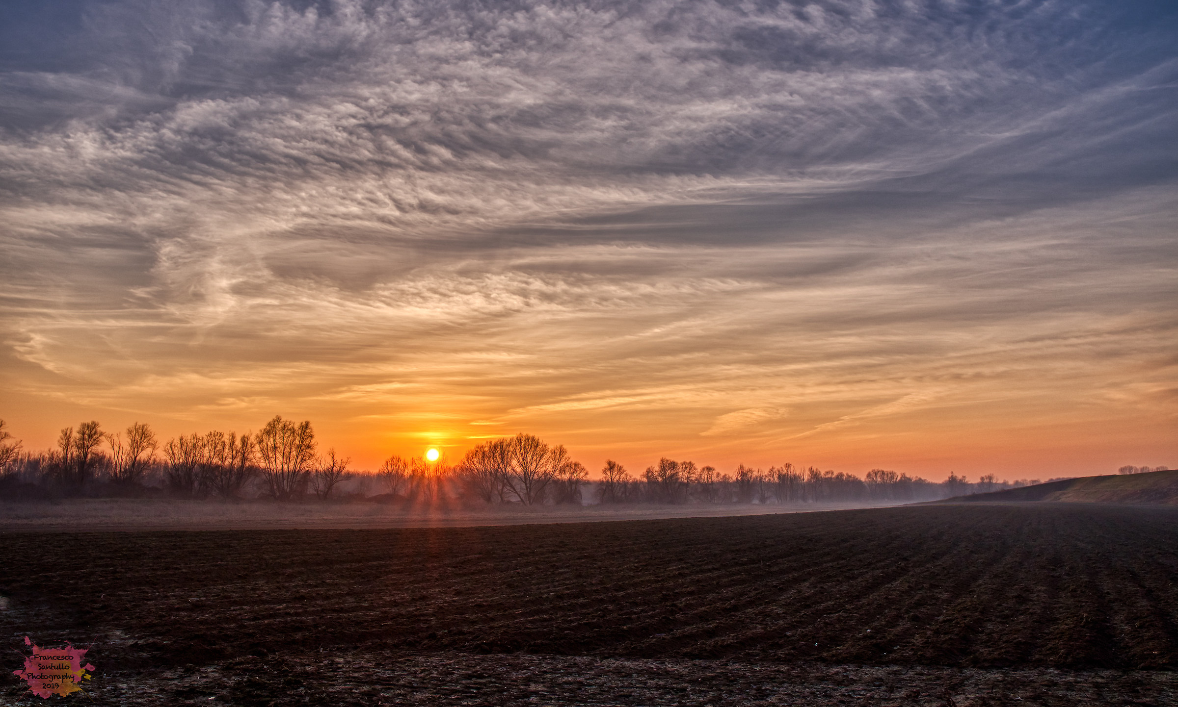 Between fields and the sunset..