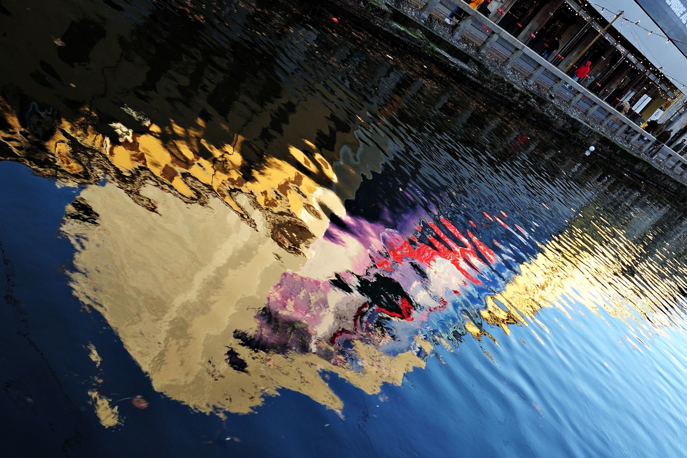 Reflections in the Naviglio Grande