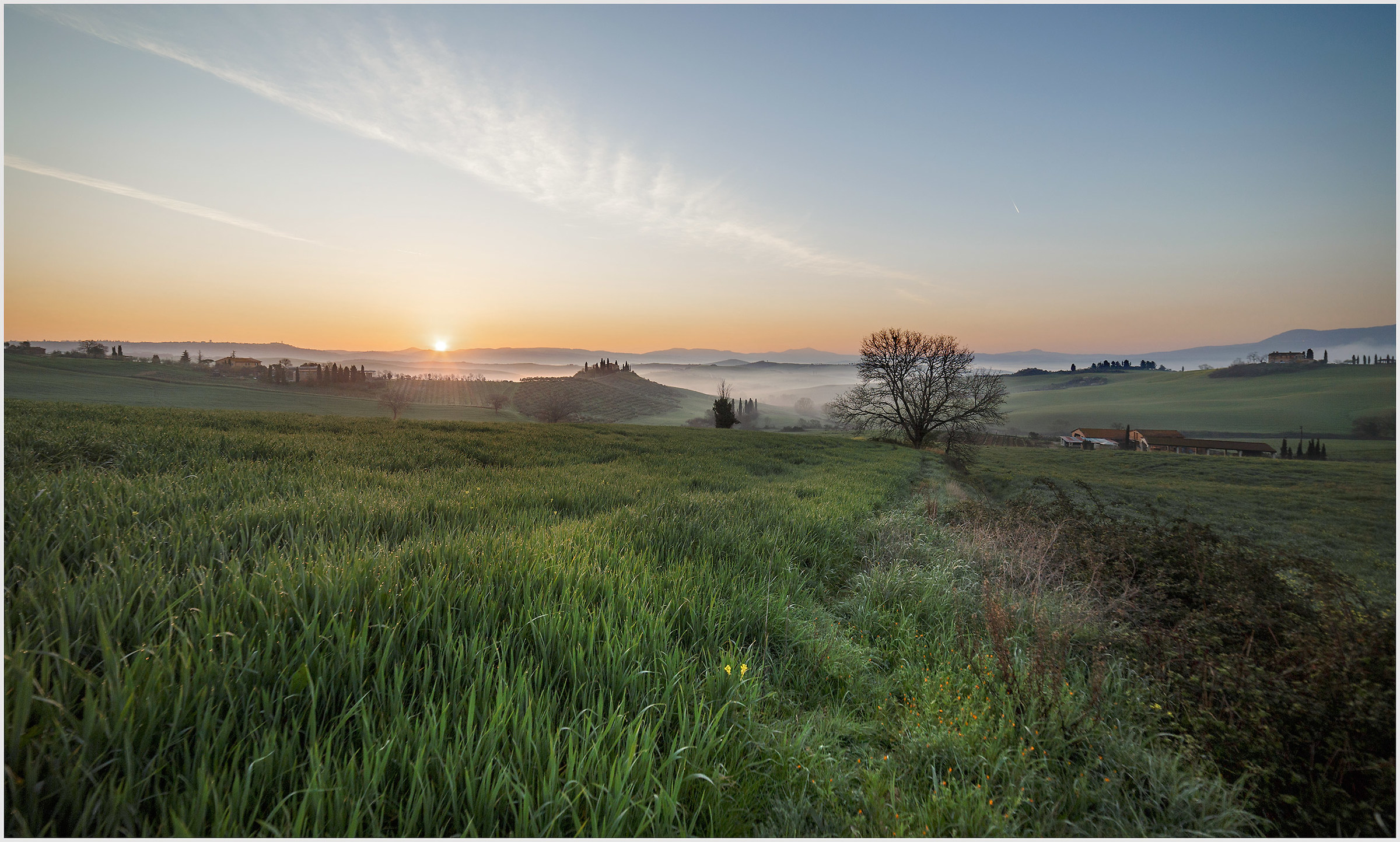 The sunrise in the countryside of S. Quirico