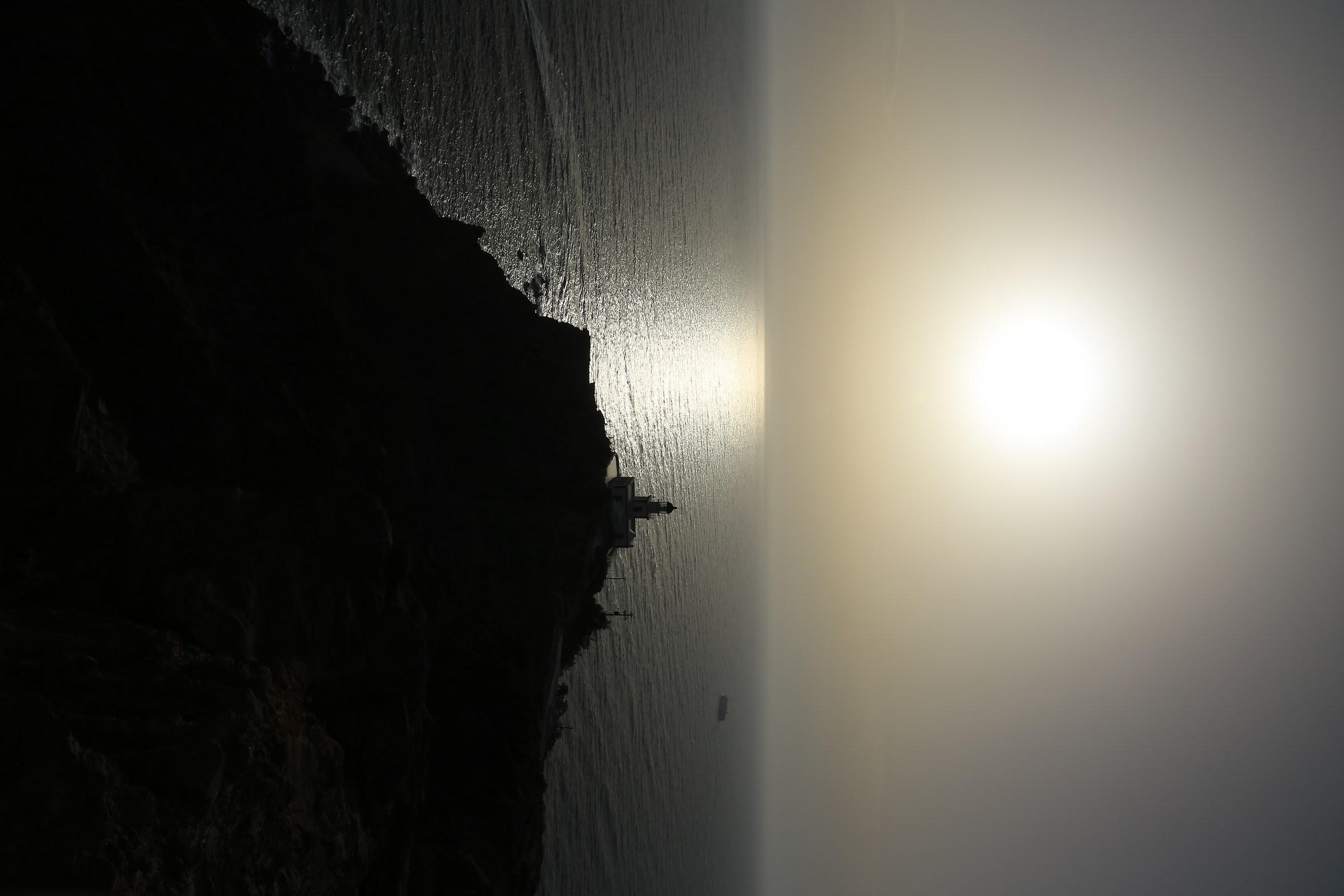 faro di Akrotiri al tramonto