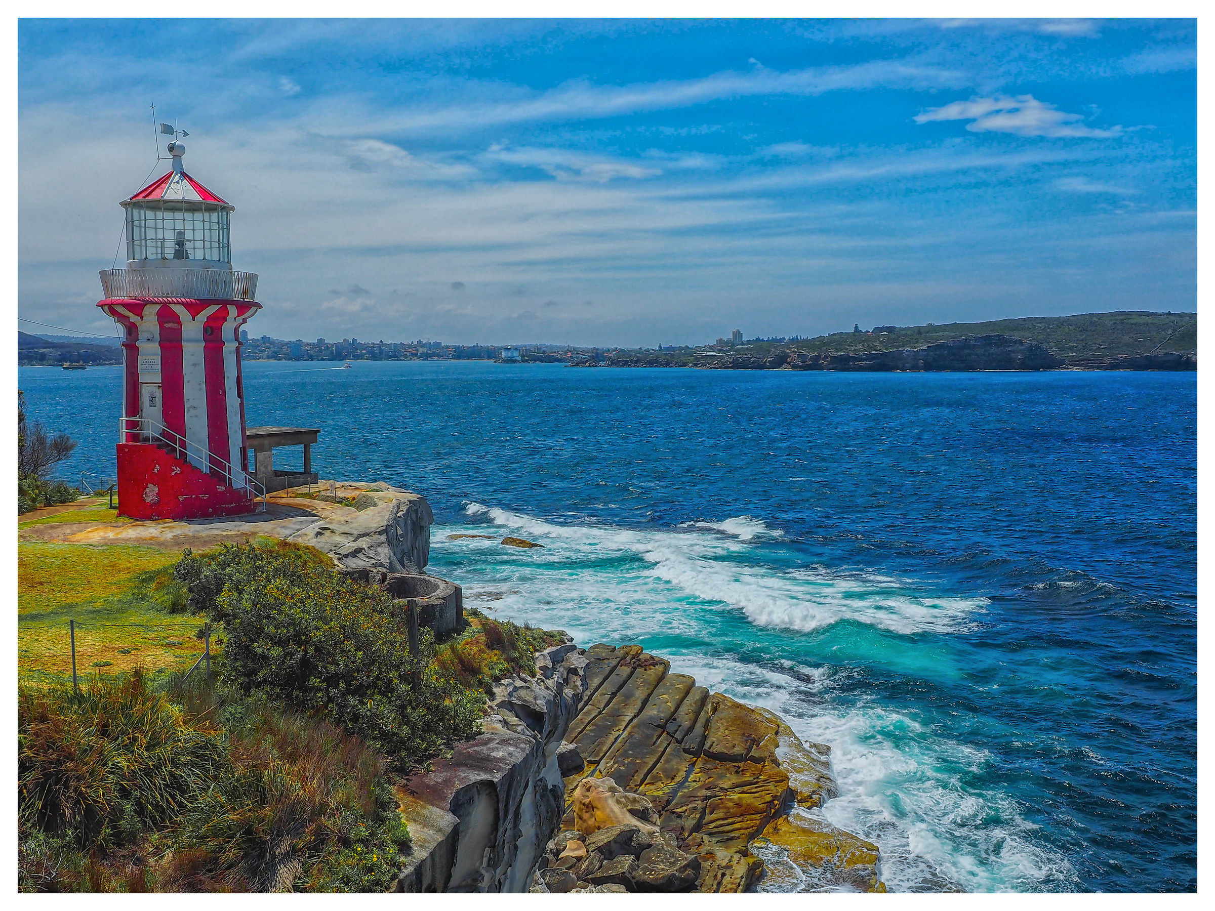The lighthouse at the bottom of the bay