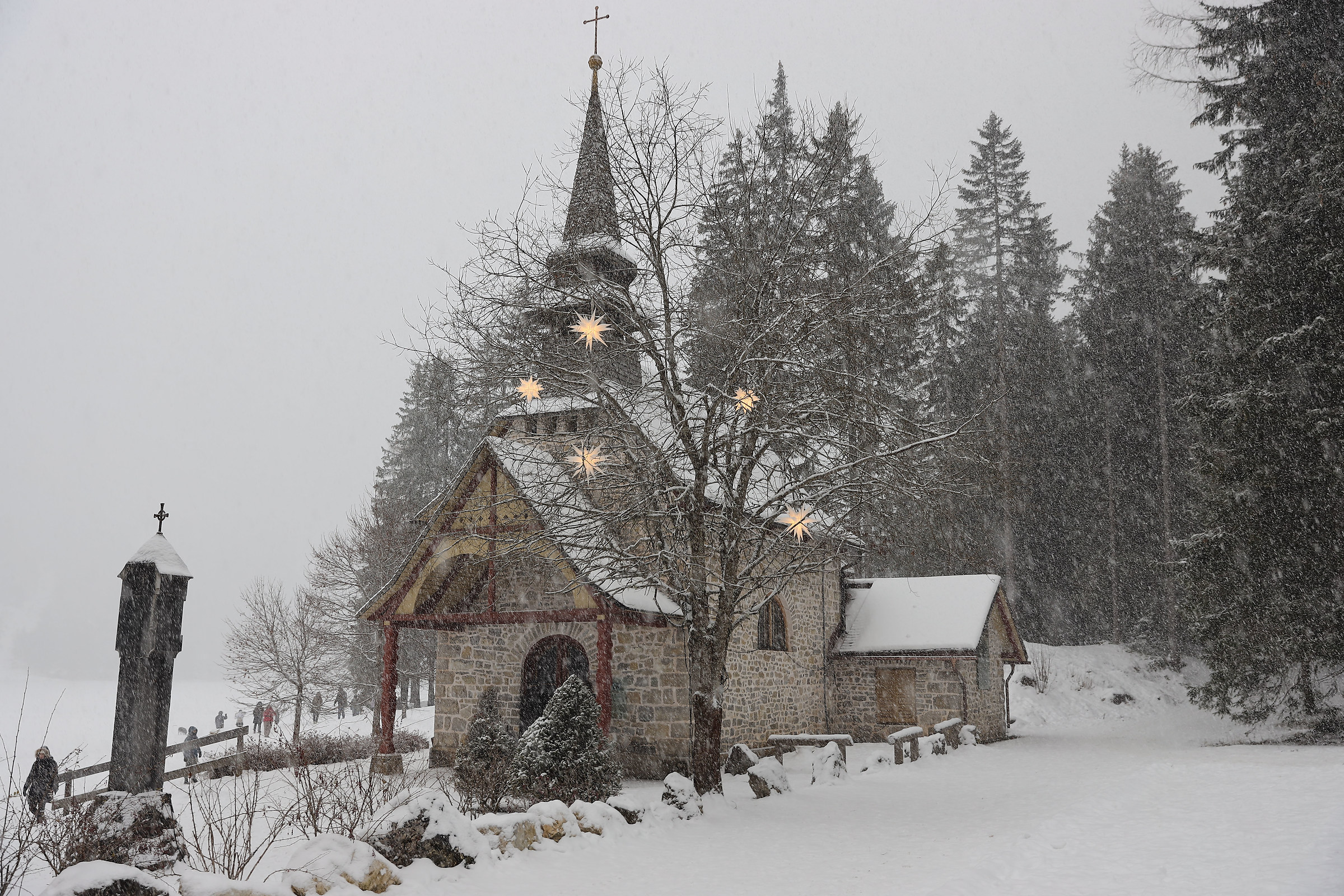 Chiesina in Braies under a heavy snowstorm