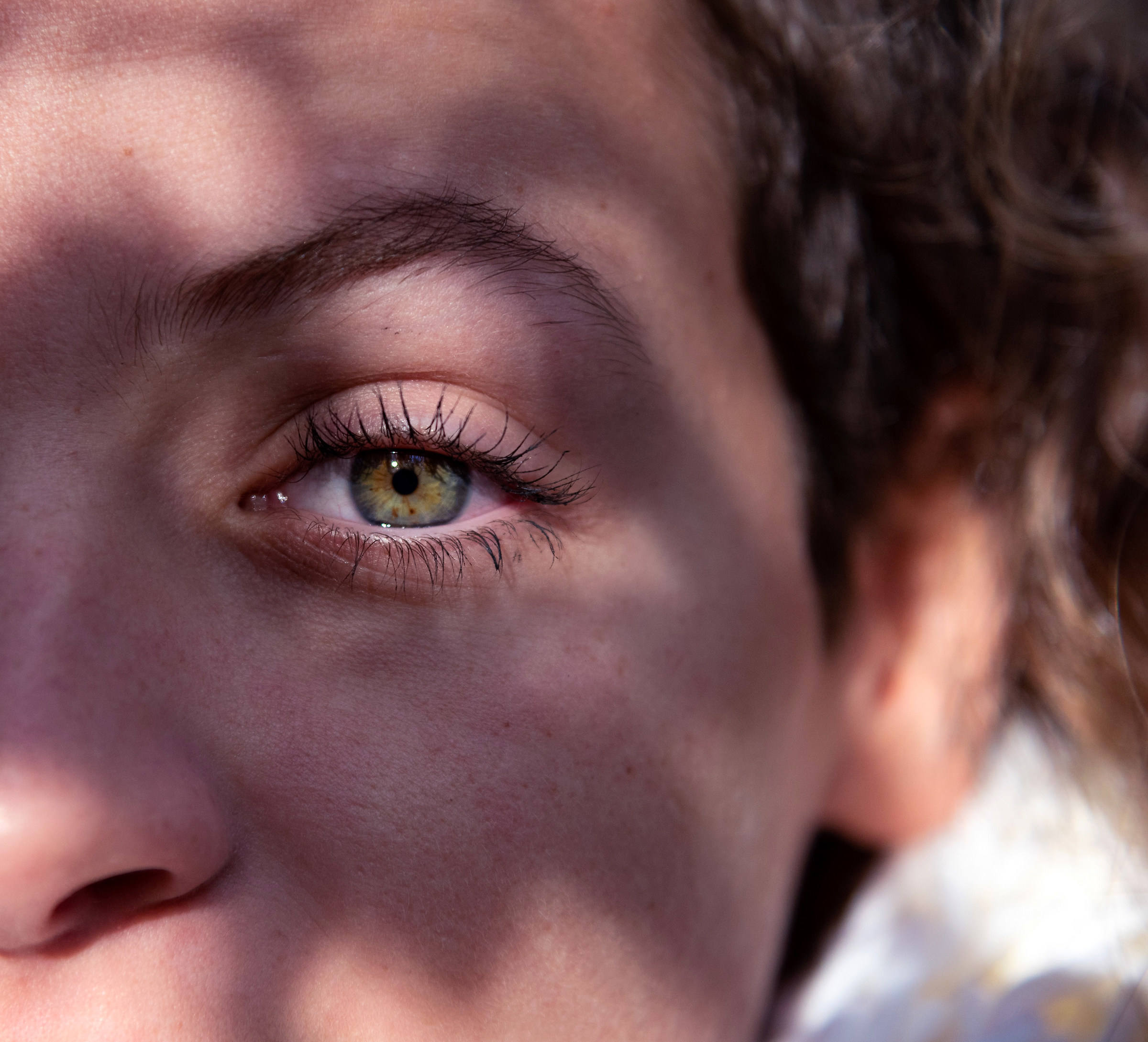 Gaze between light and shadow.