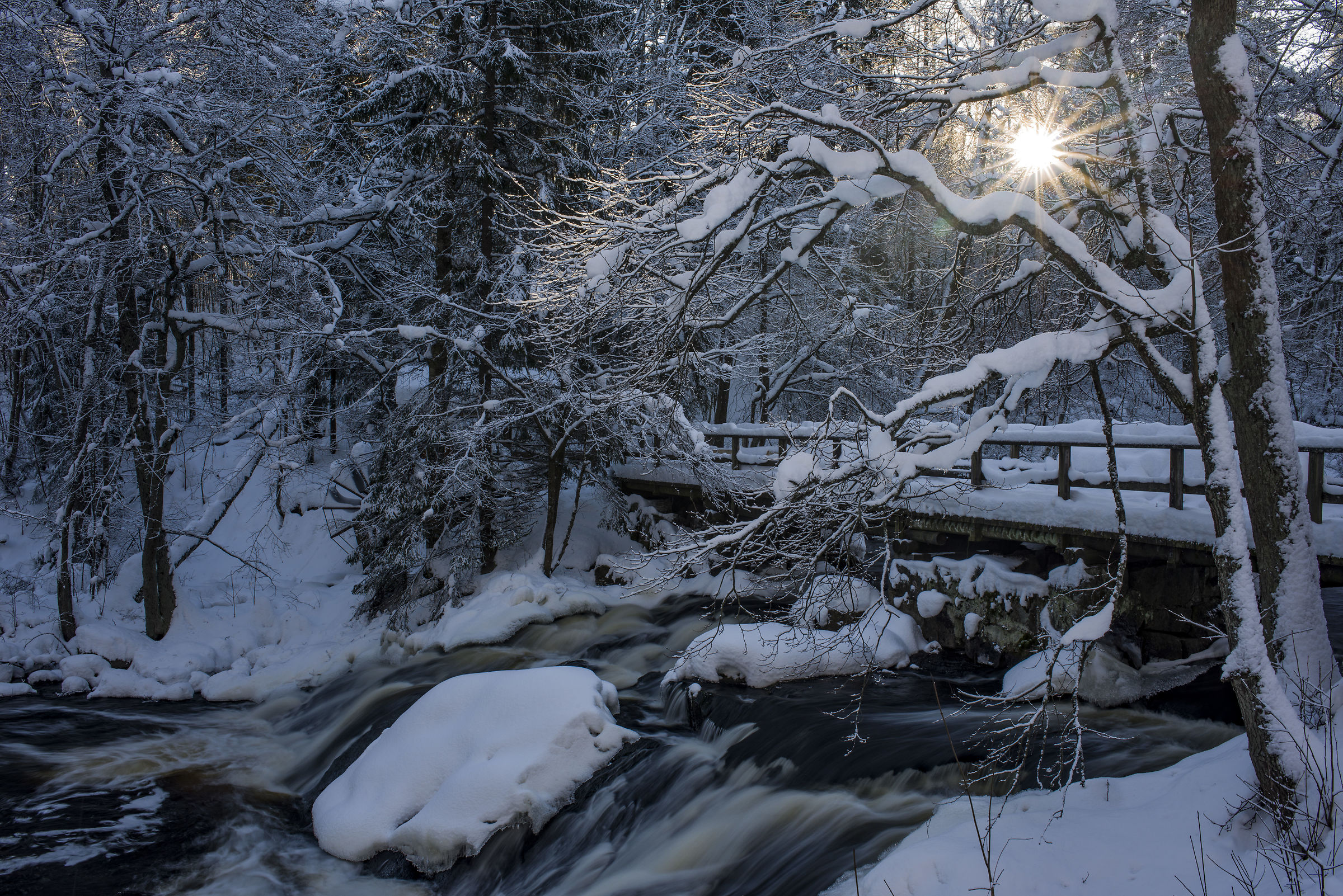 Bridge over waterfall
