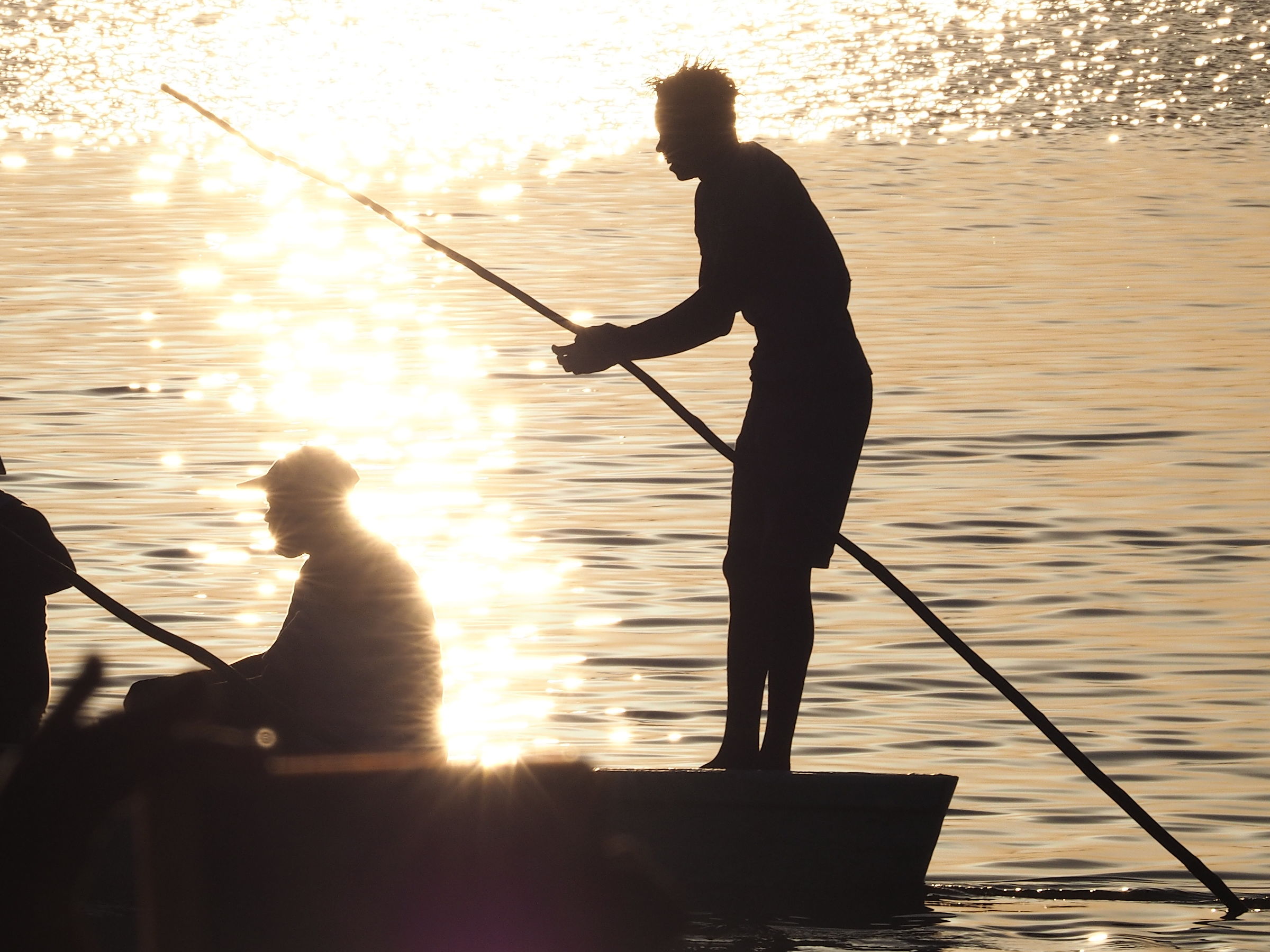 Boatman at sunset