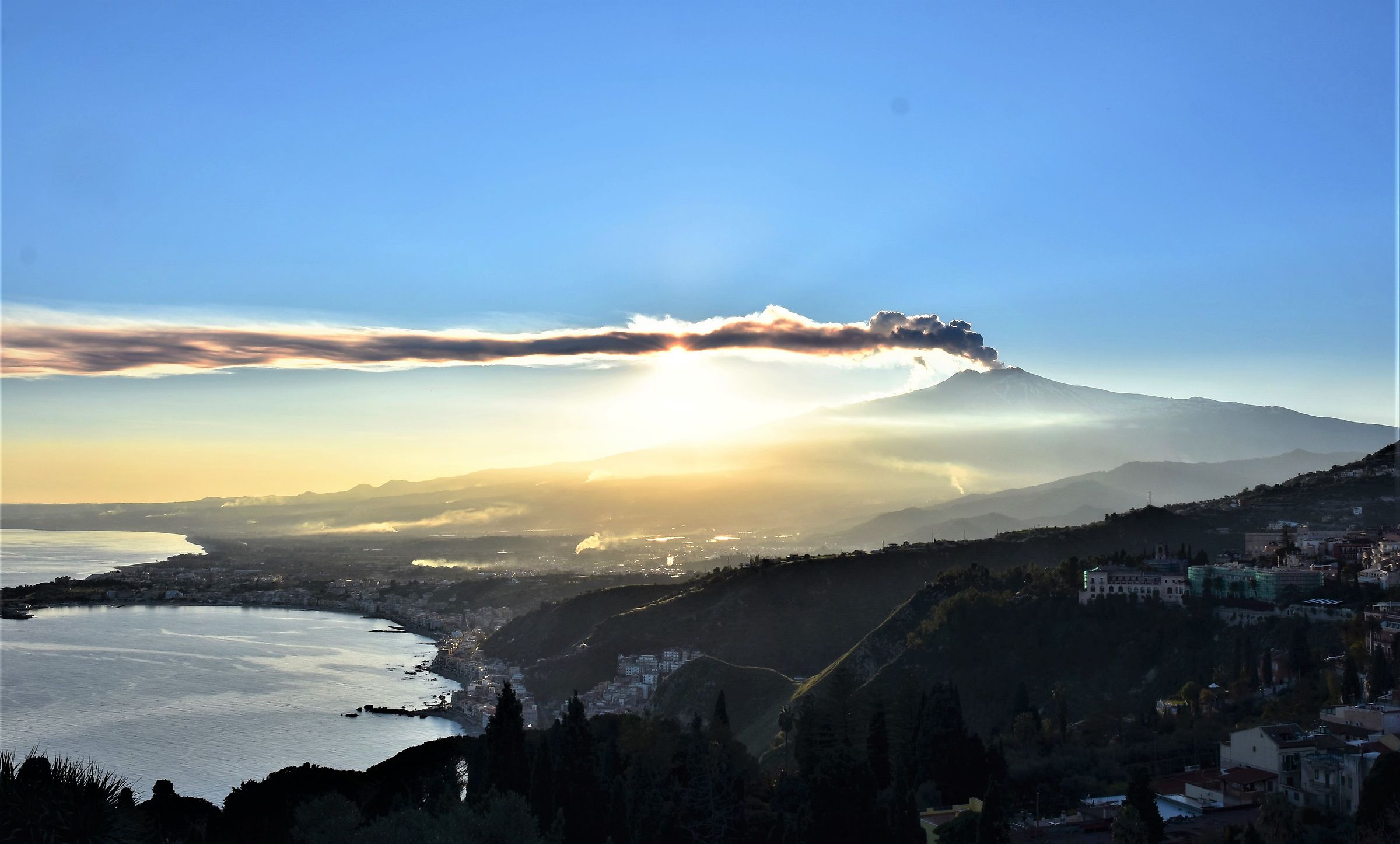 Etna seen from the amphitheatre of Taormina at sunset