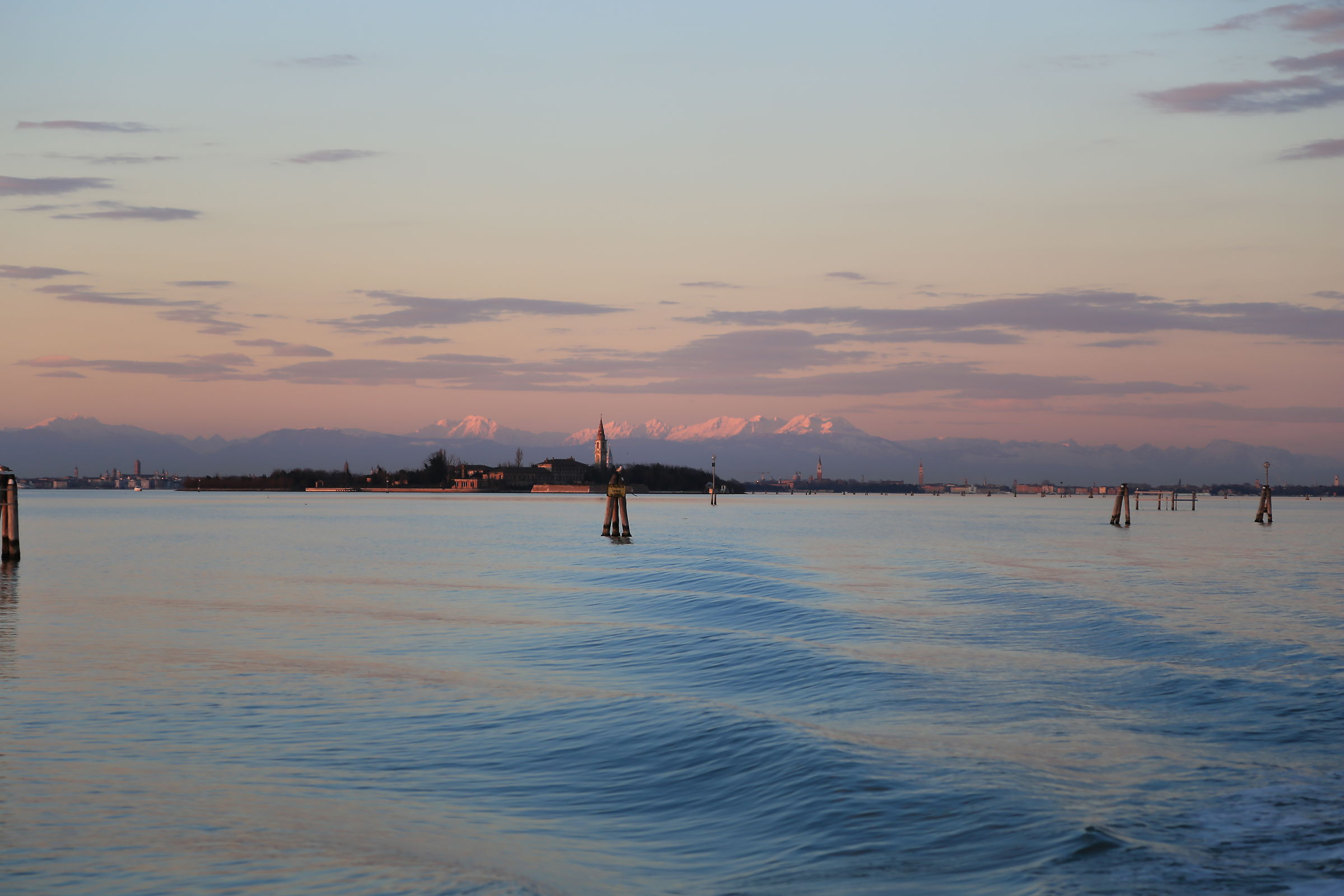 Sunset over the lagoon with the Dolomites in the background