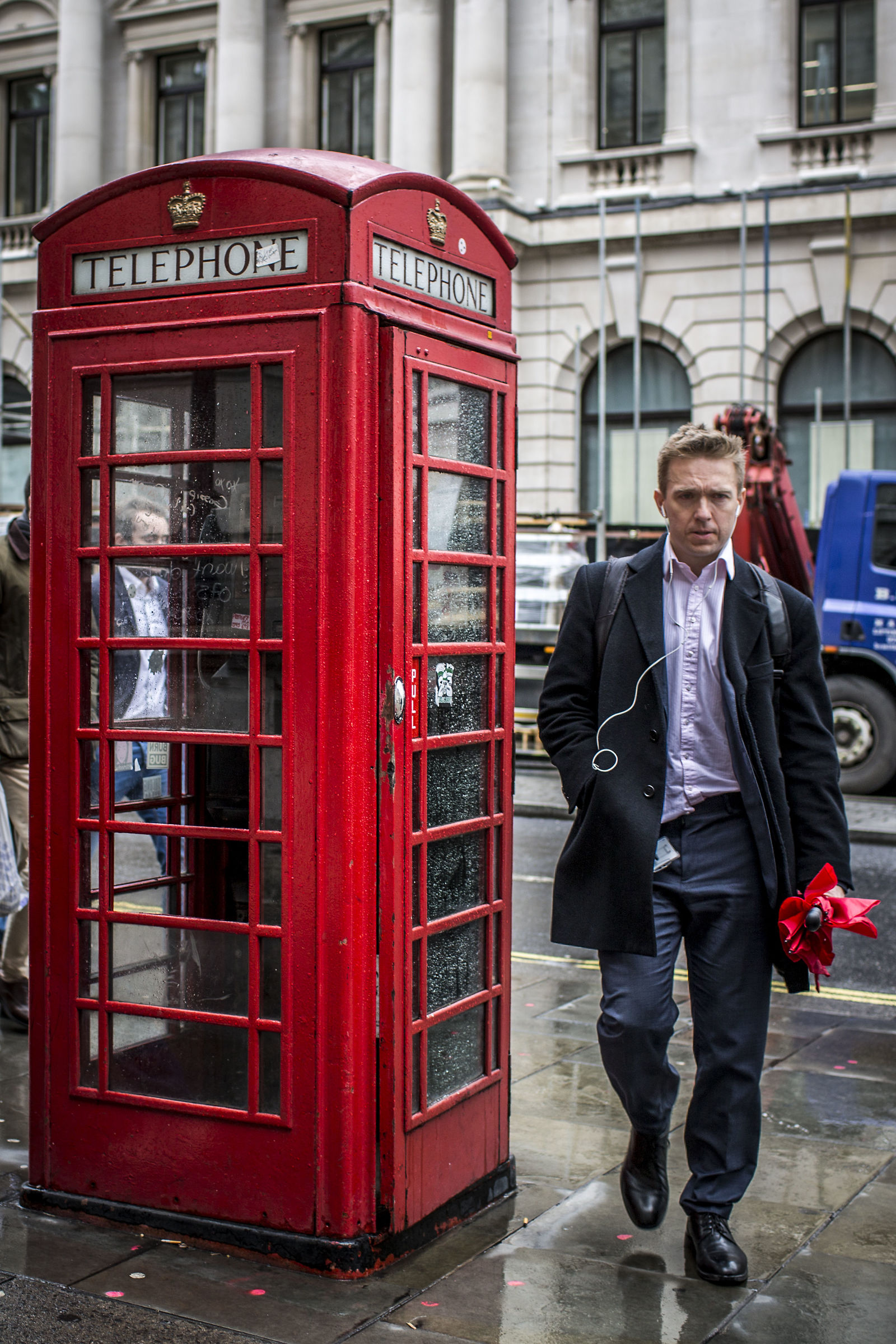 A man and a Phone box