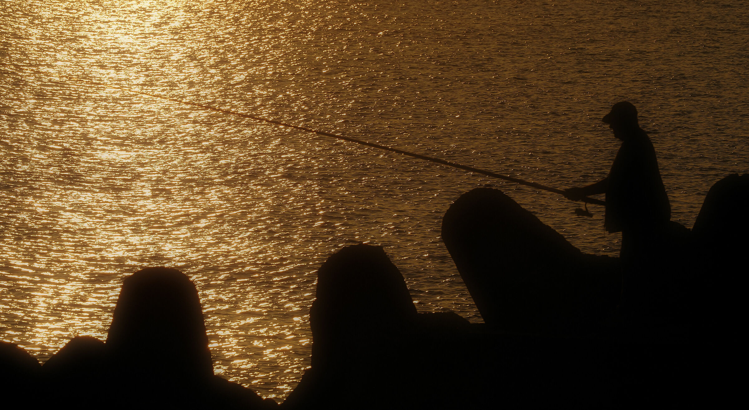 Fisherman on the Rocks