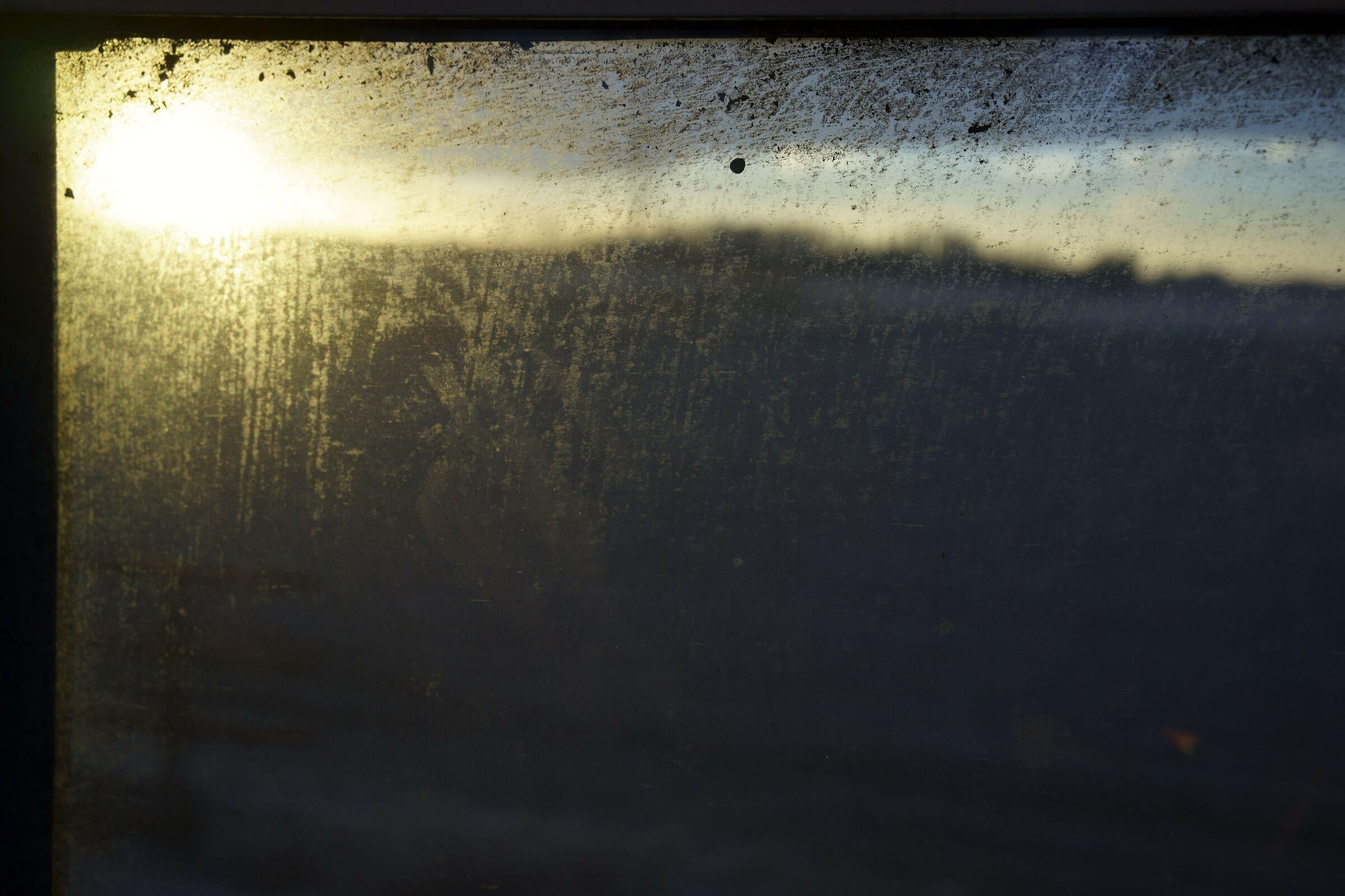 Tramonto sporco (dal finestrino)