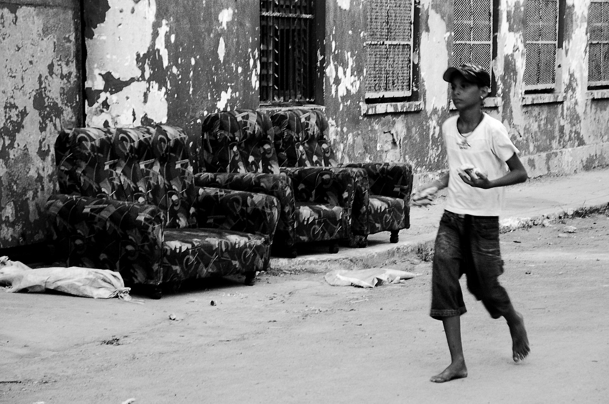 Cuba - Centro Habana: Child Running in Bare Feet