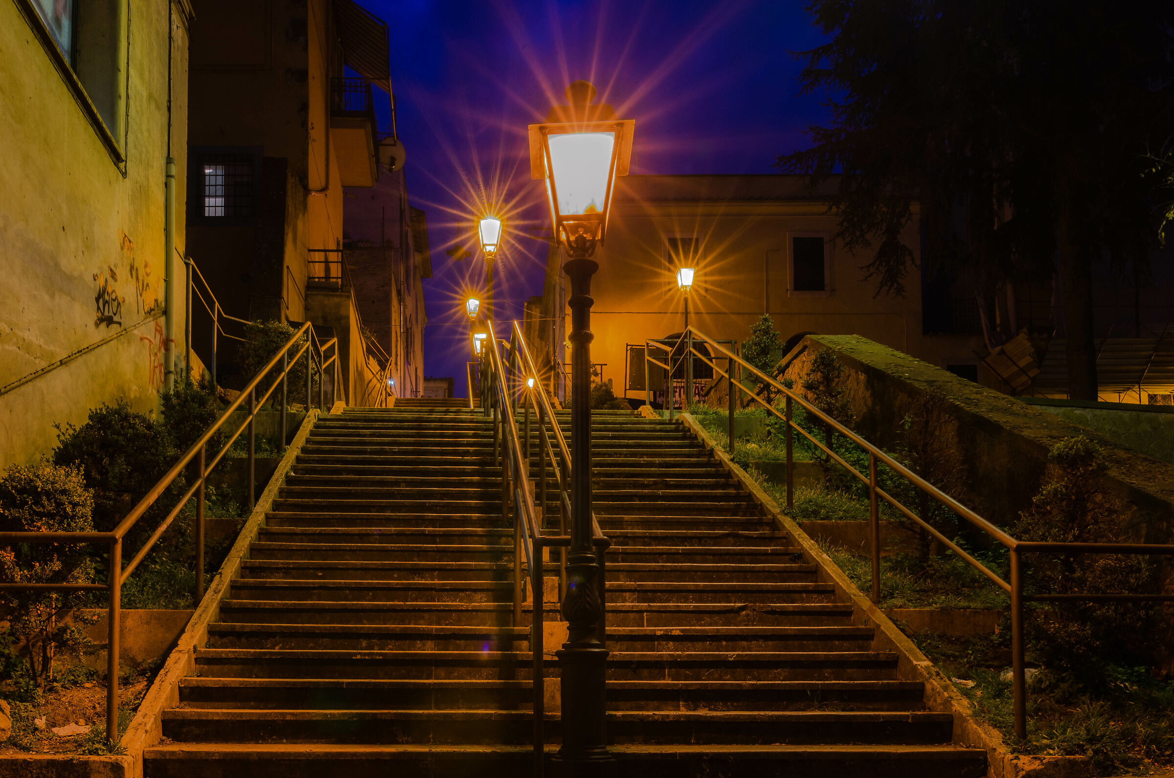 Under the light of the lampposts