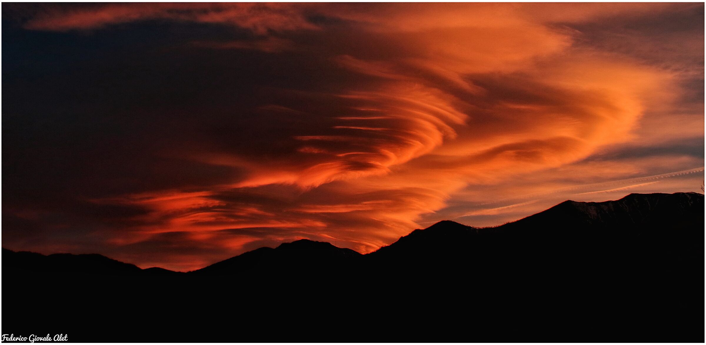Lenticular clouds at sunset