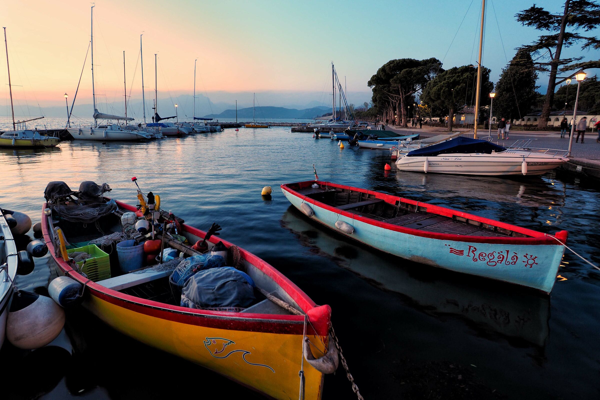 It is evening at the lake