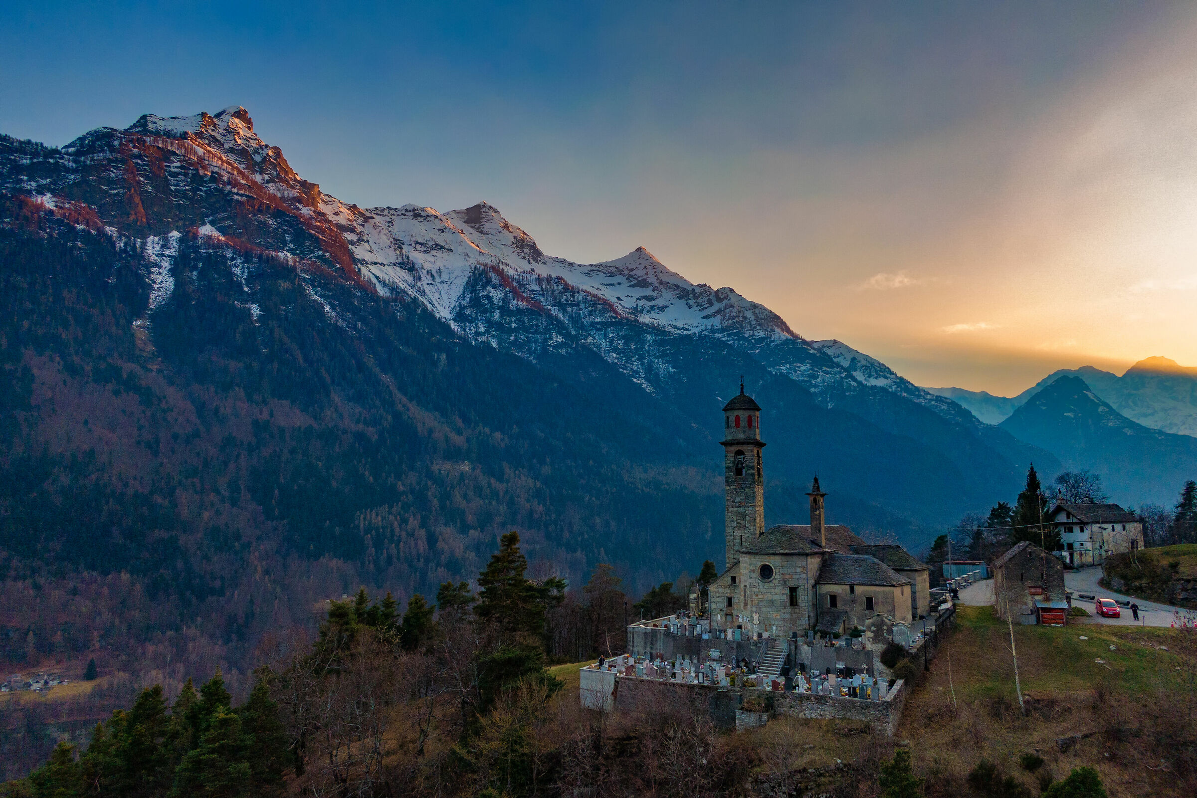 House and Church and mountains