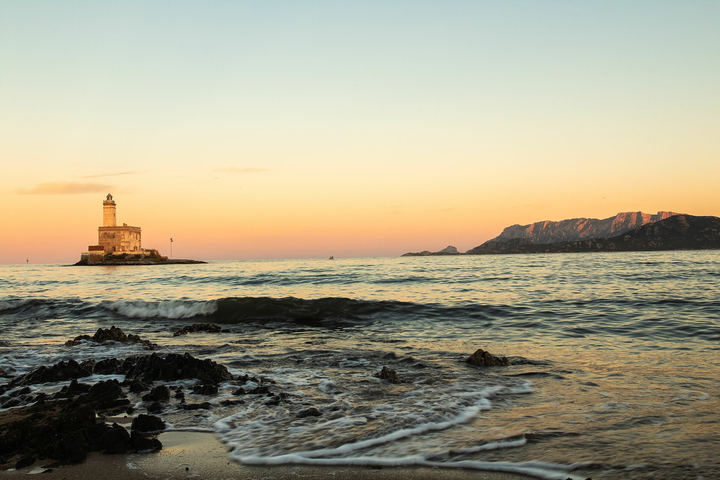 The lighthouse and Tavolara..