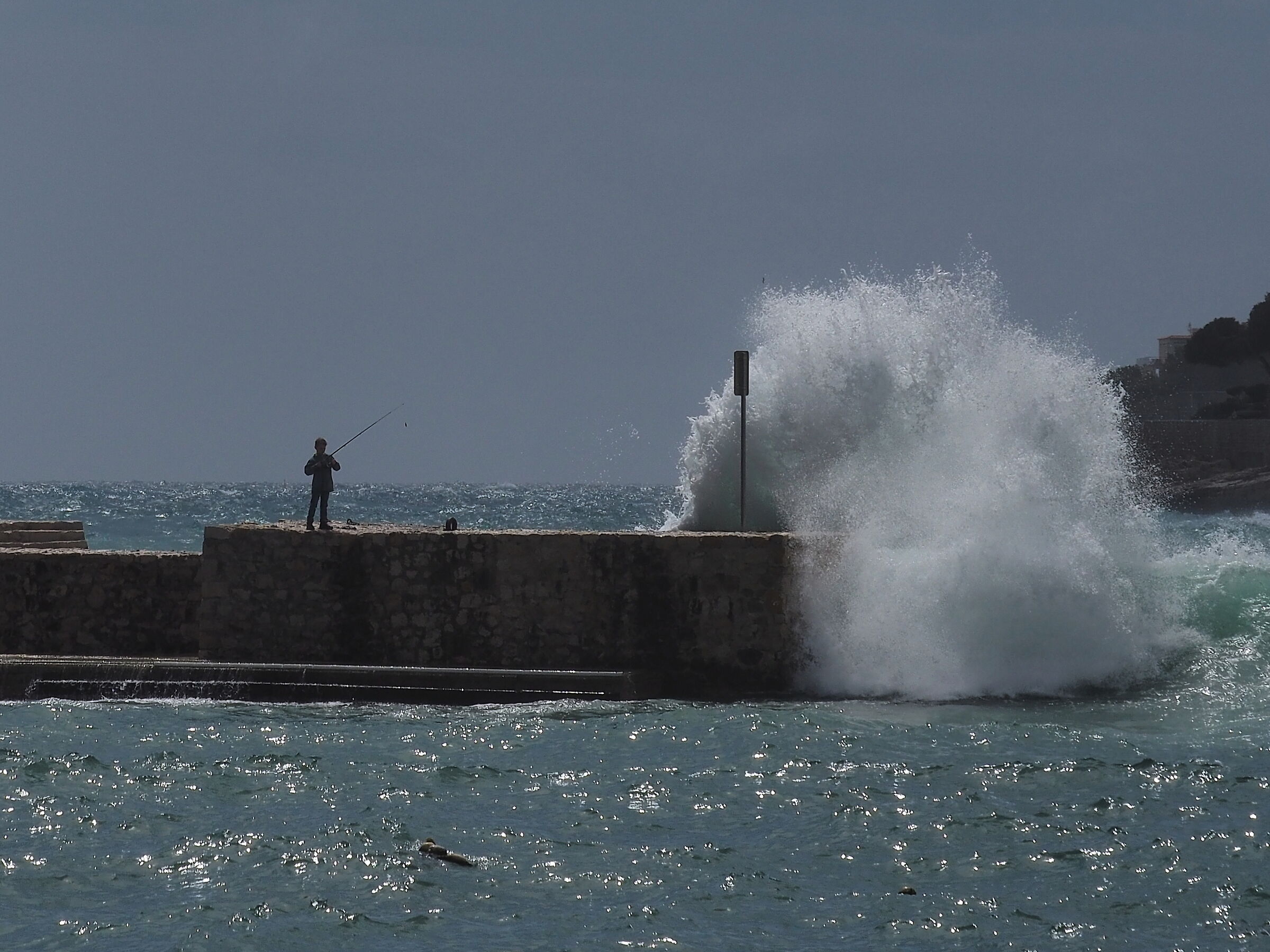 Boy continues to fish