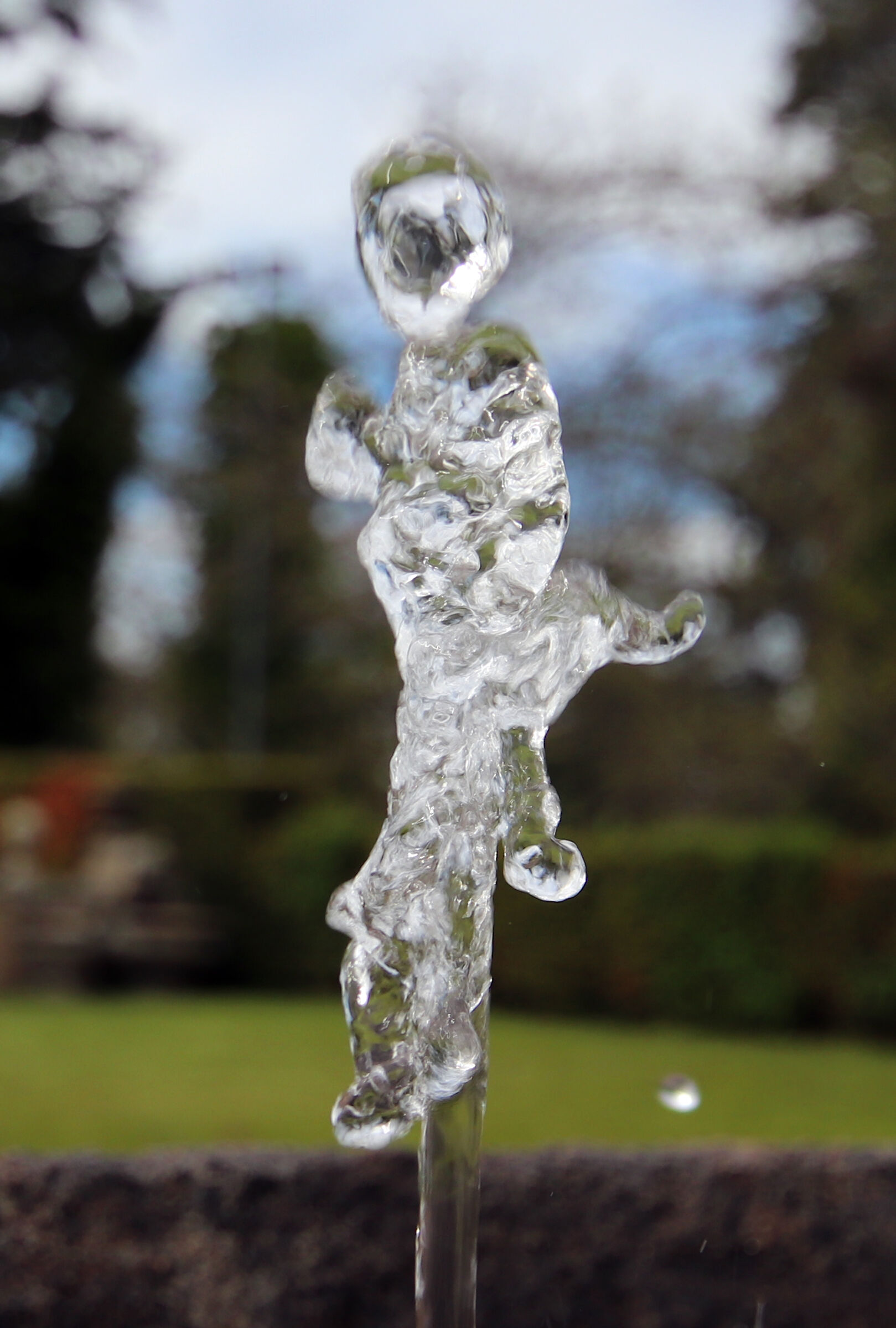 Water game. A Gush woman with baby