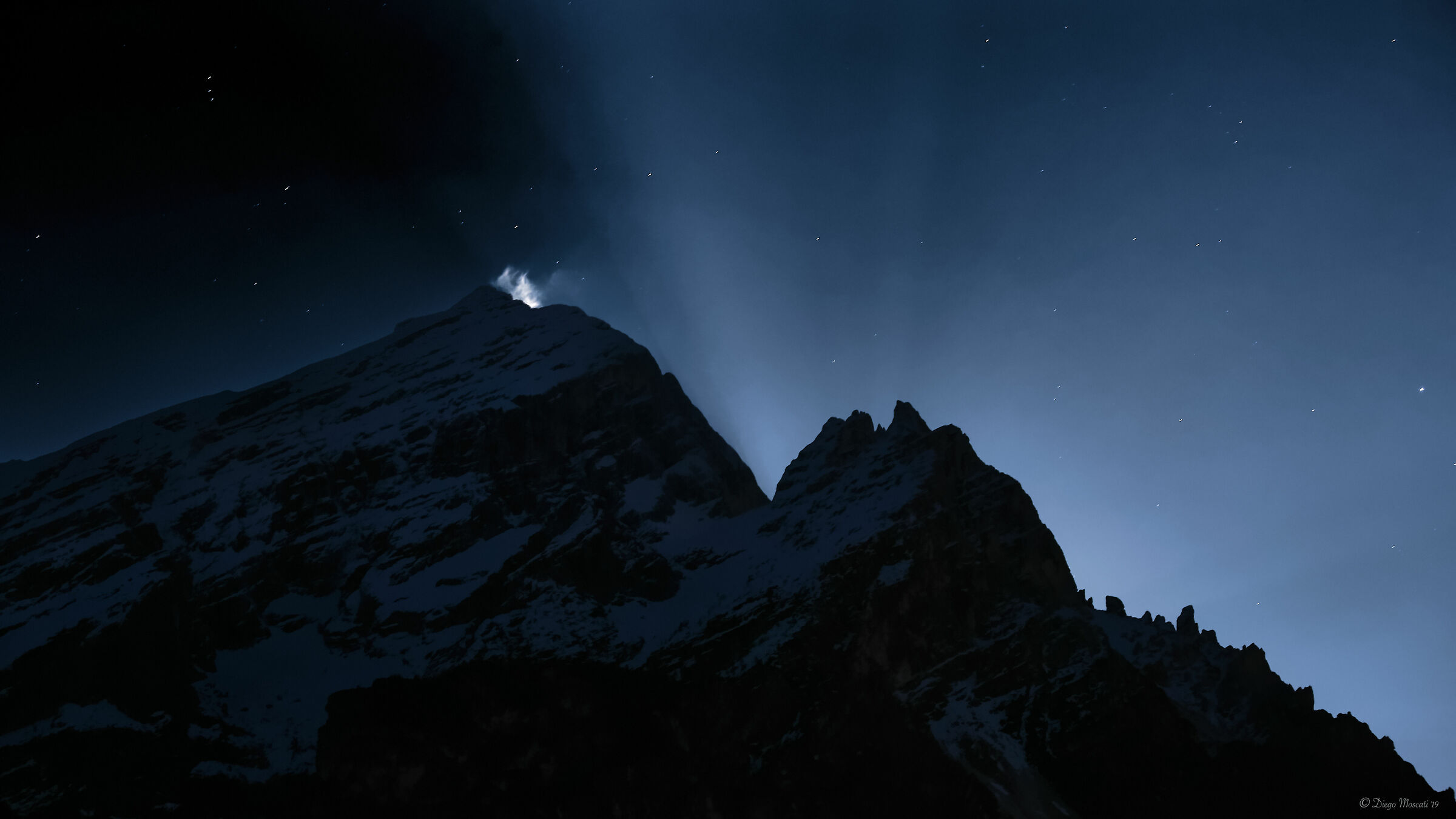 The moon rises behind the Antelaus