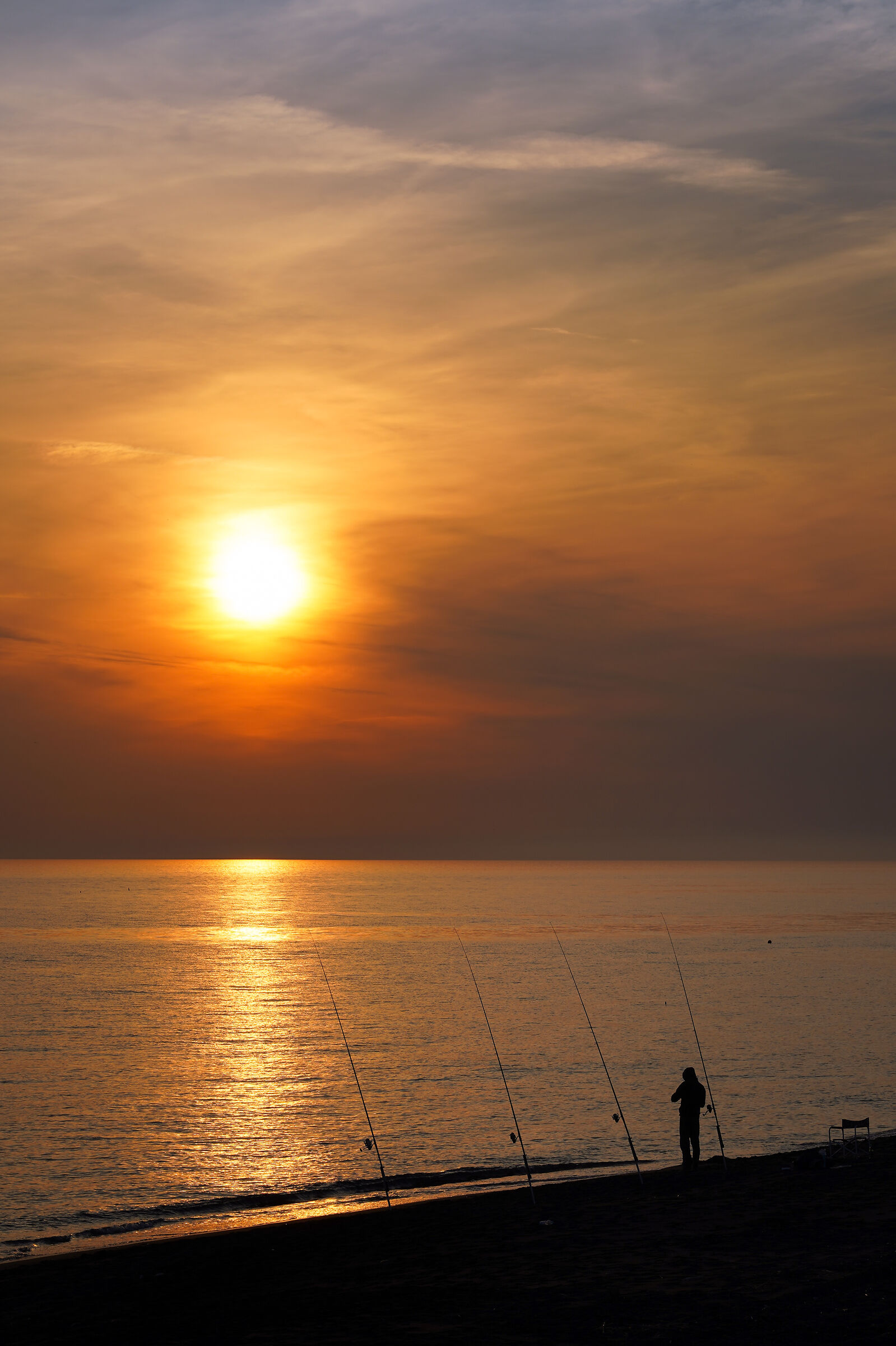 Ladispoli-Four rods at sunset...