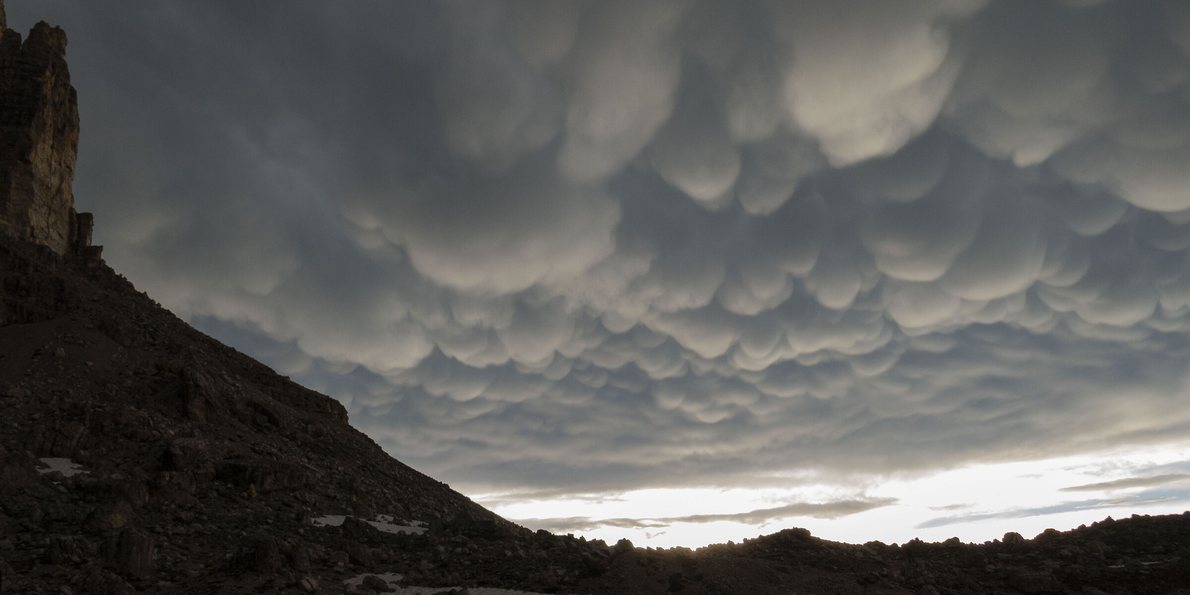Clouds "mammatus" on the Dolomites (Sella group)