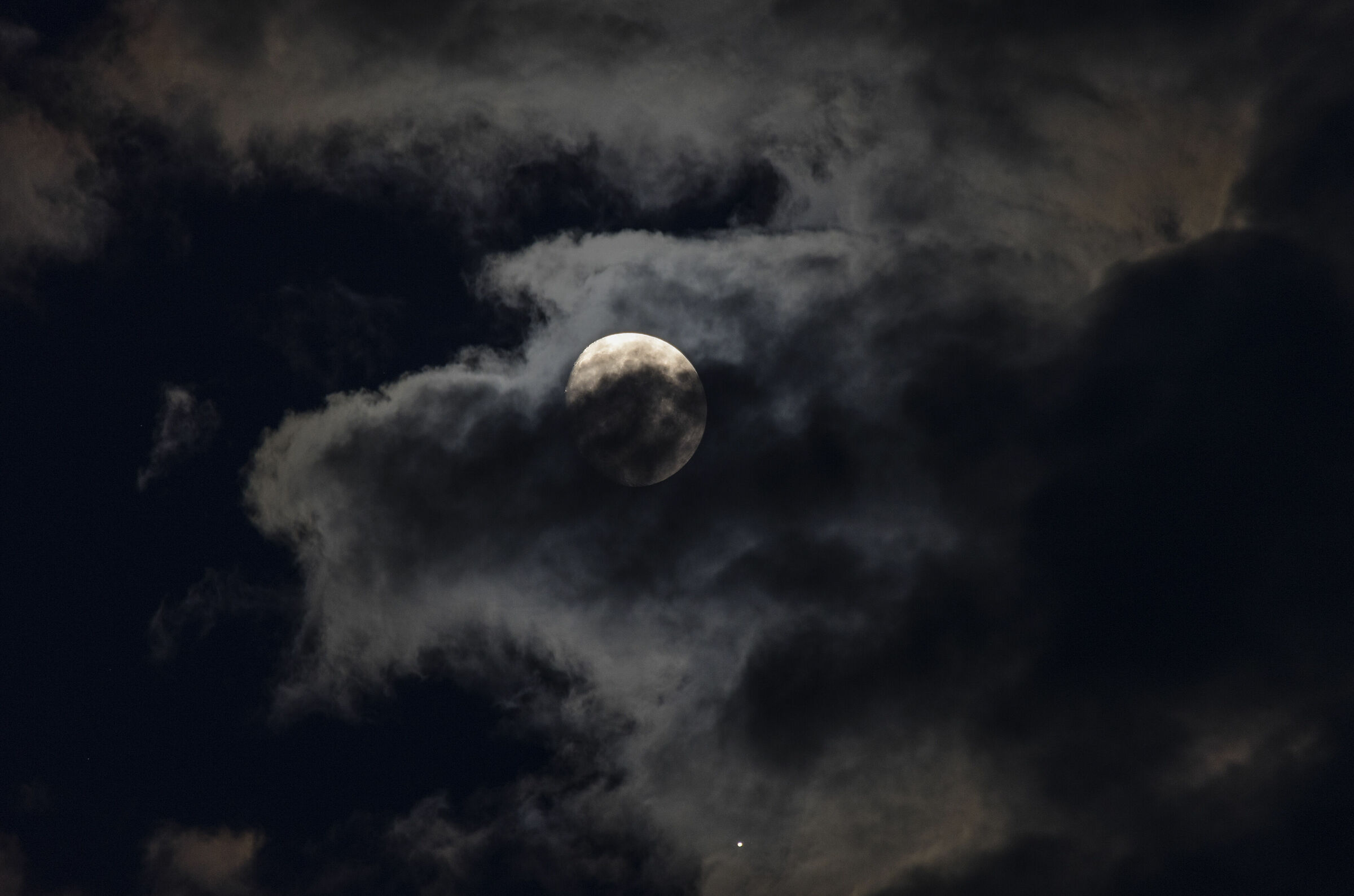 Moon and Jupiter in the clouds