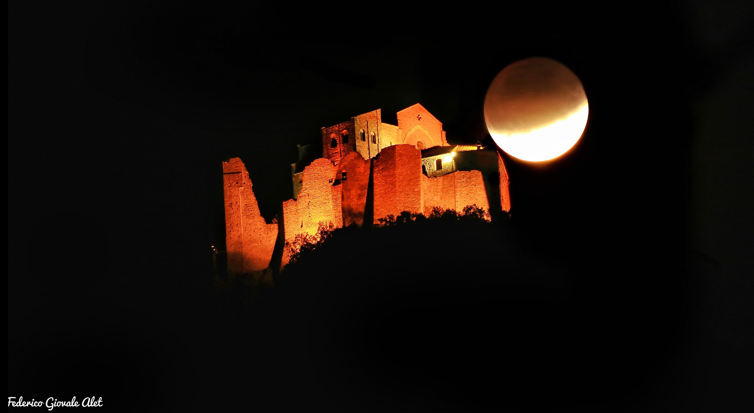 Partial lunar eclipse on the Sacred