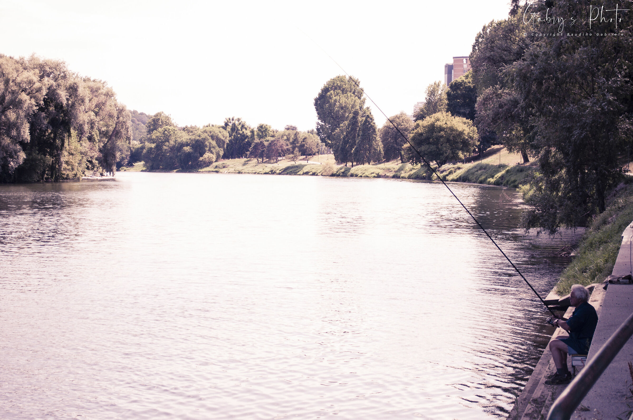 A fisherman - River Po in Turin