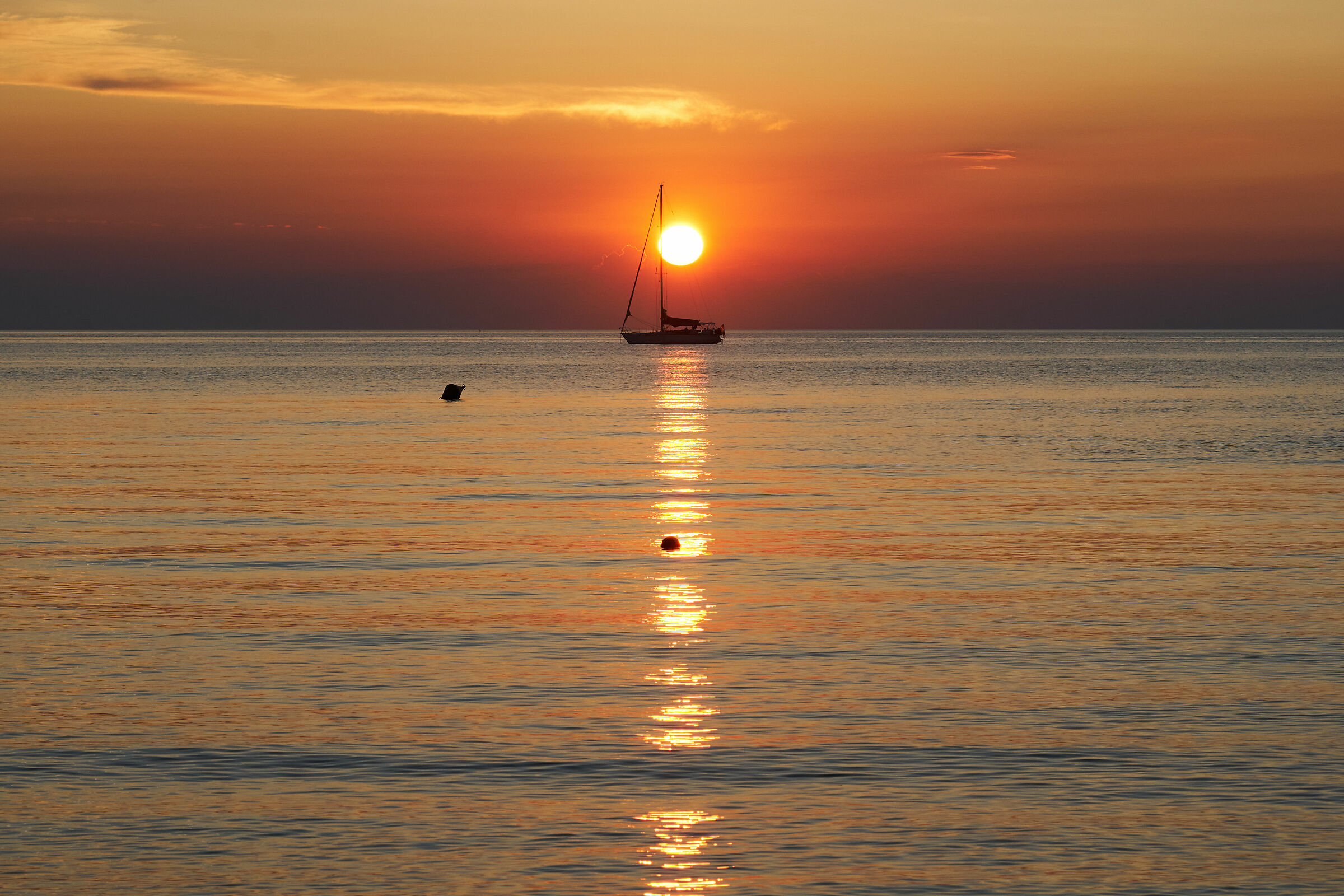 Placido, afoso tramonto estivo