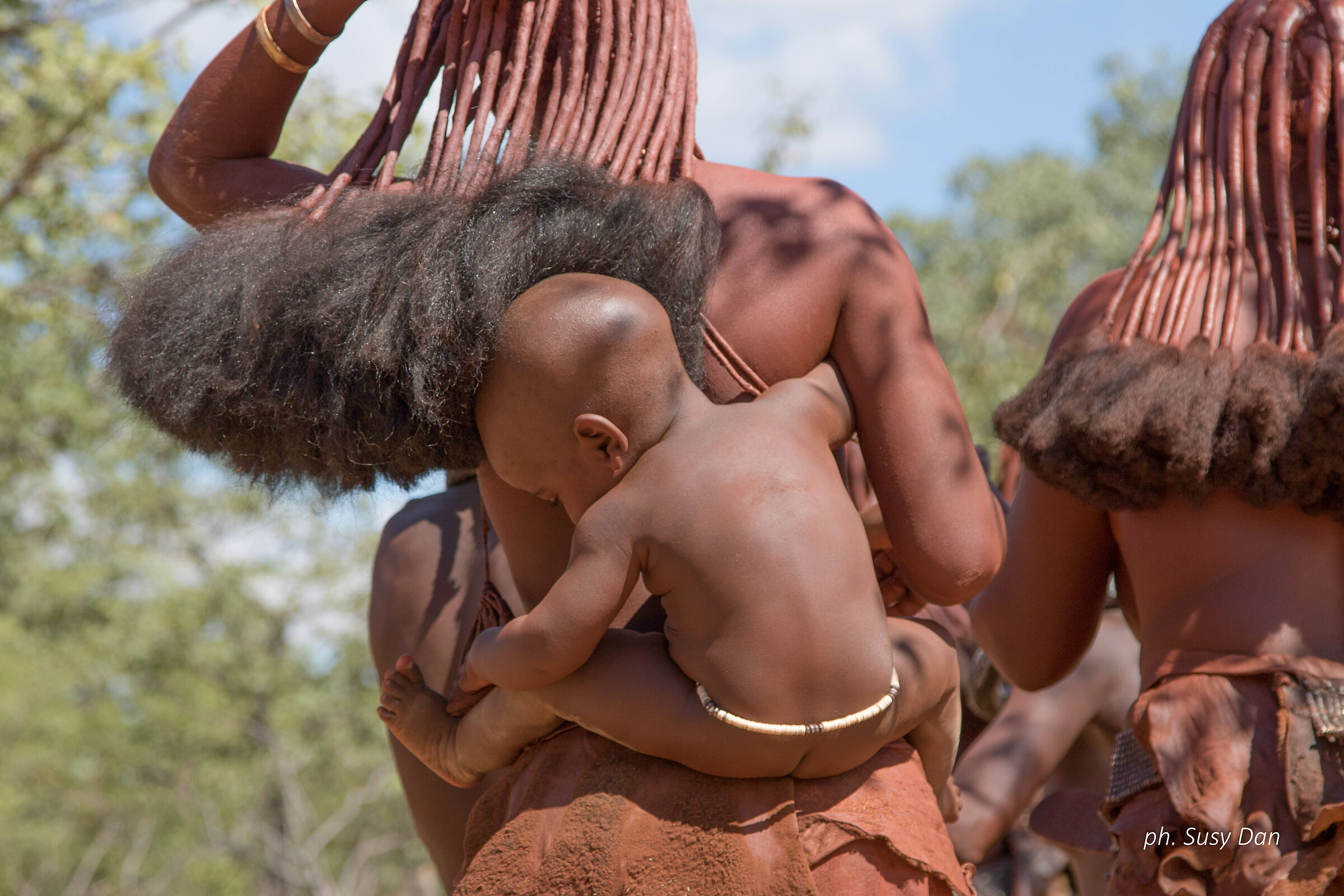 Mom and child in a Himba village