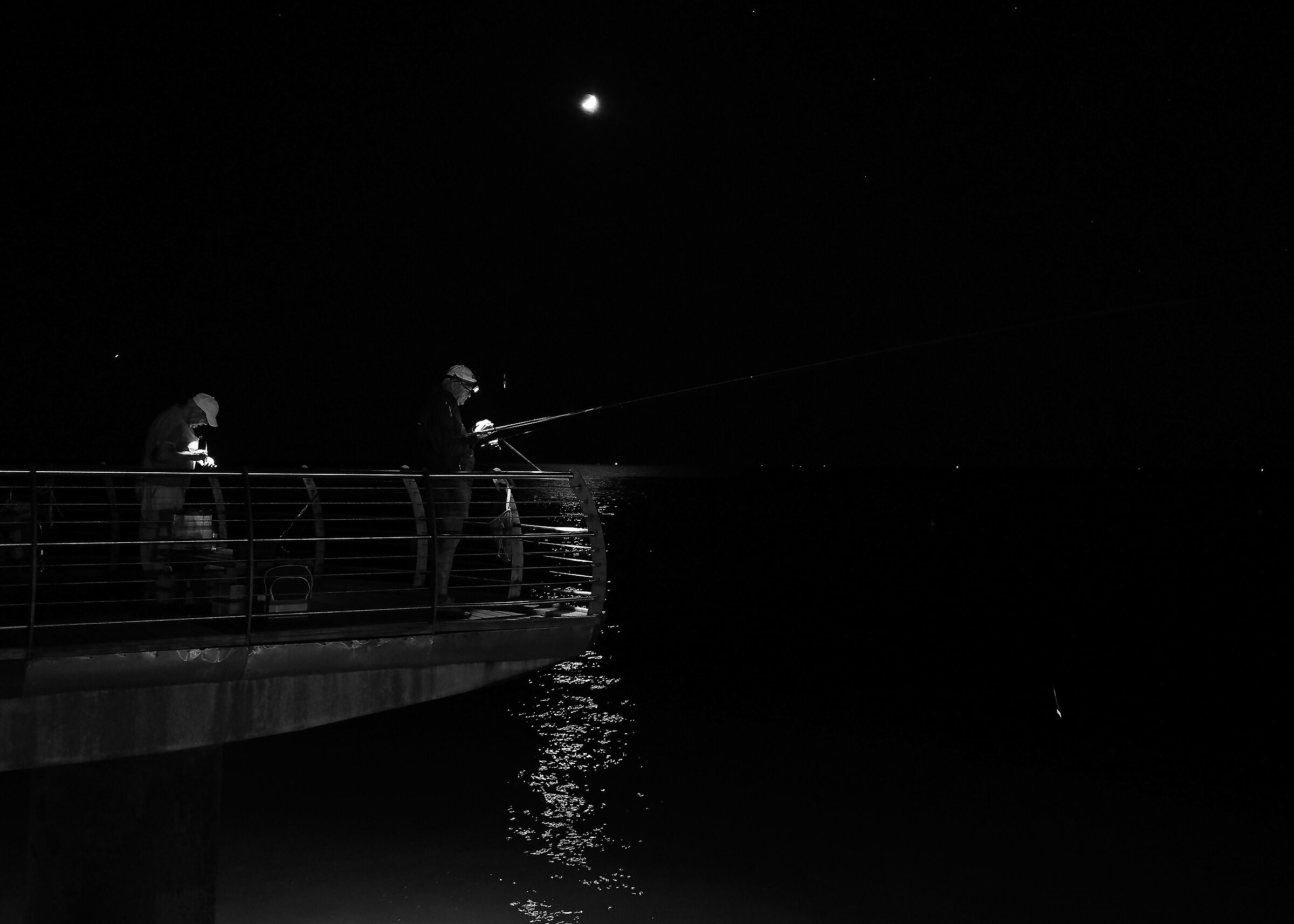 Fishermen in the moonlight