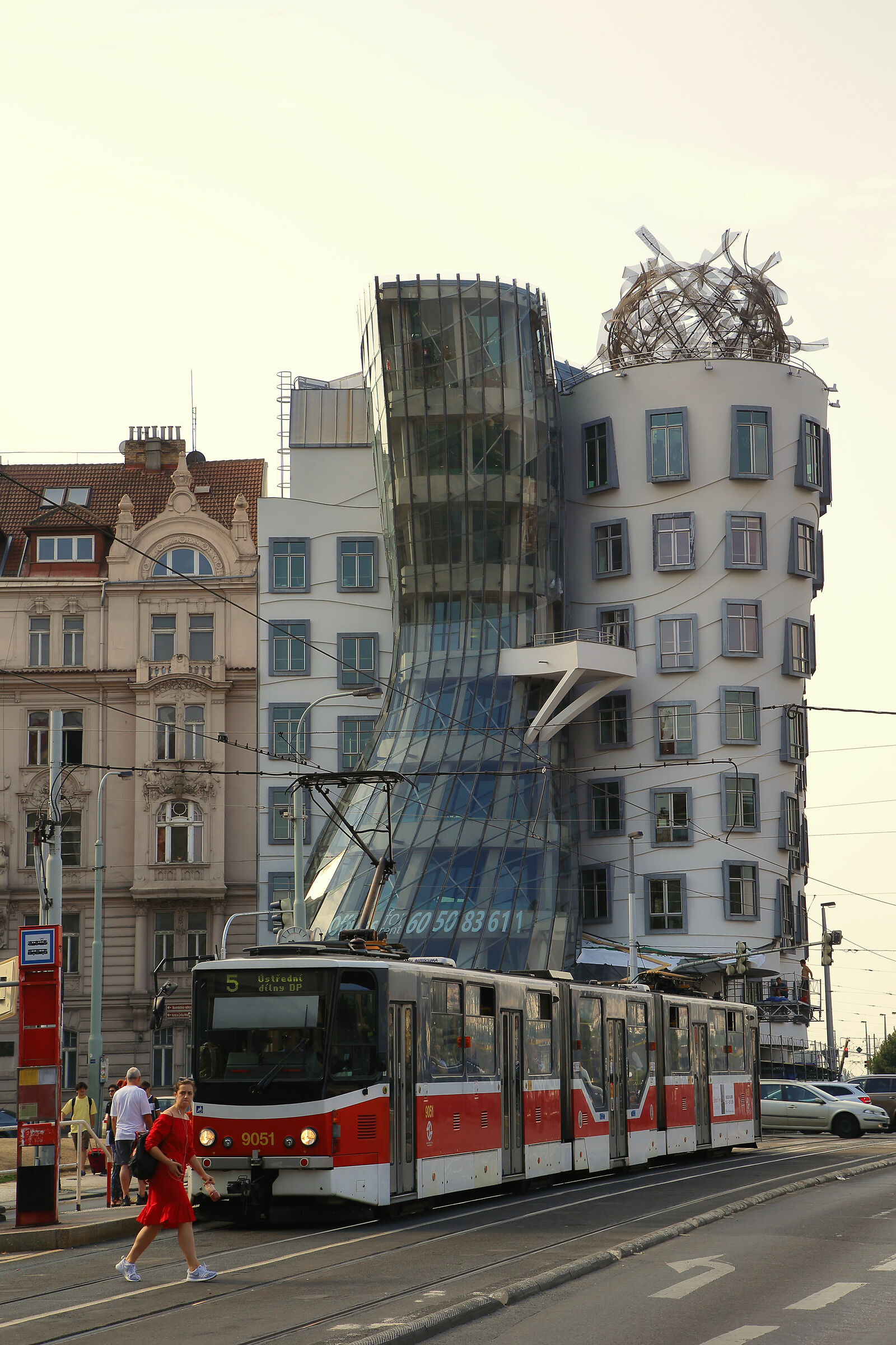 Dancing house in Prague with a bit of traffic